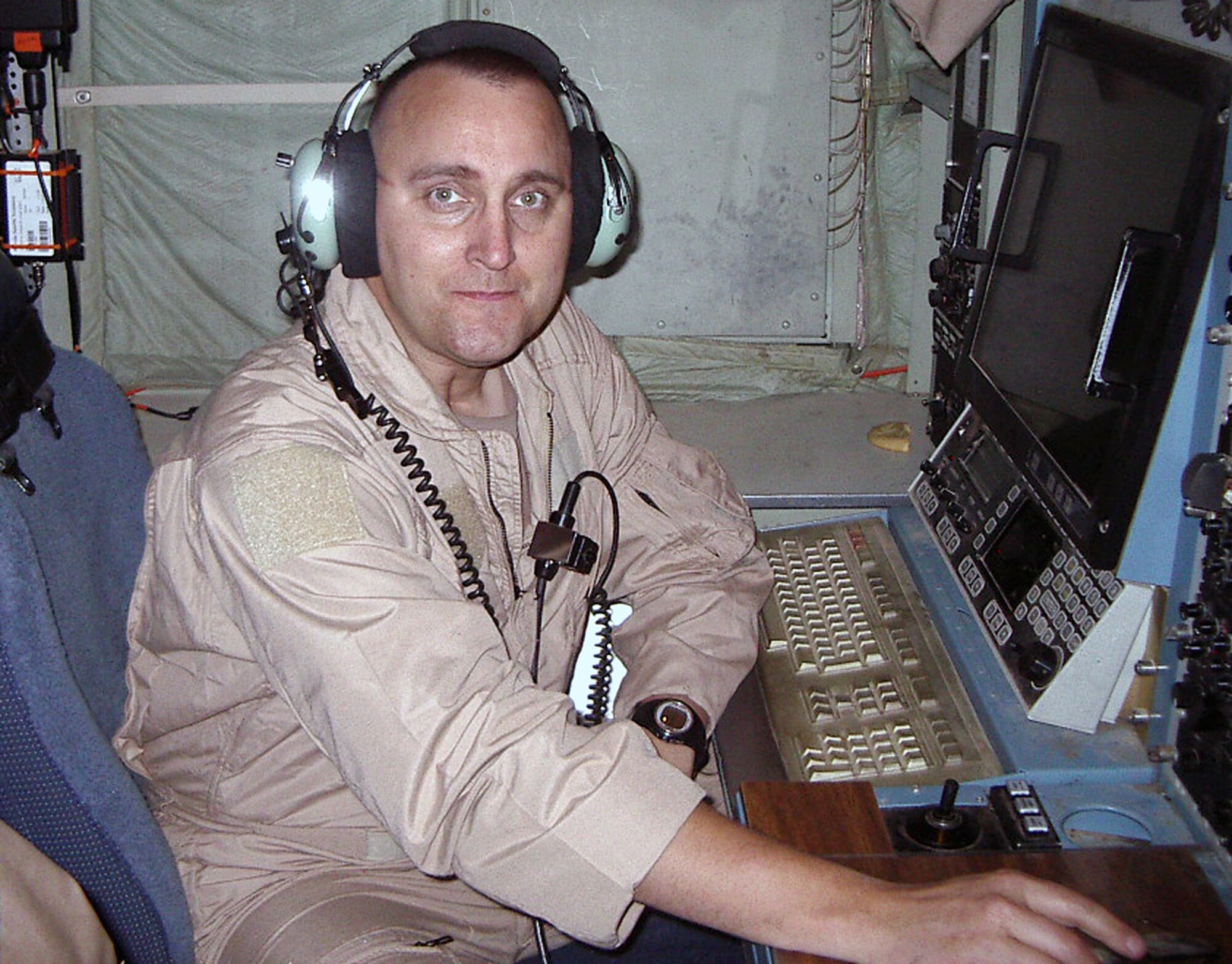 SOUTHWEST ASIA -- Tech. Sgt. Jeff Poulin, 43rd Expeditionary Electronic Combat Squadron Misson Planning Cell NCOIC, is deployed from the 42nd Electronic Combat Squdron at Davis-Monthan Air Force Base, Ariz. (U.S. Air Force courtesy photo)