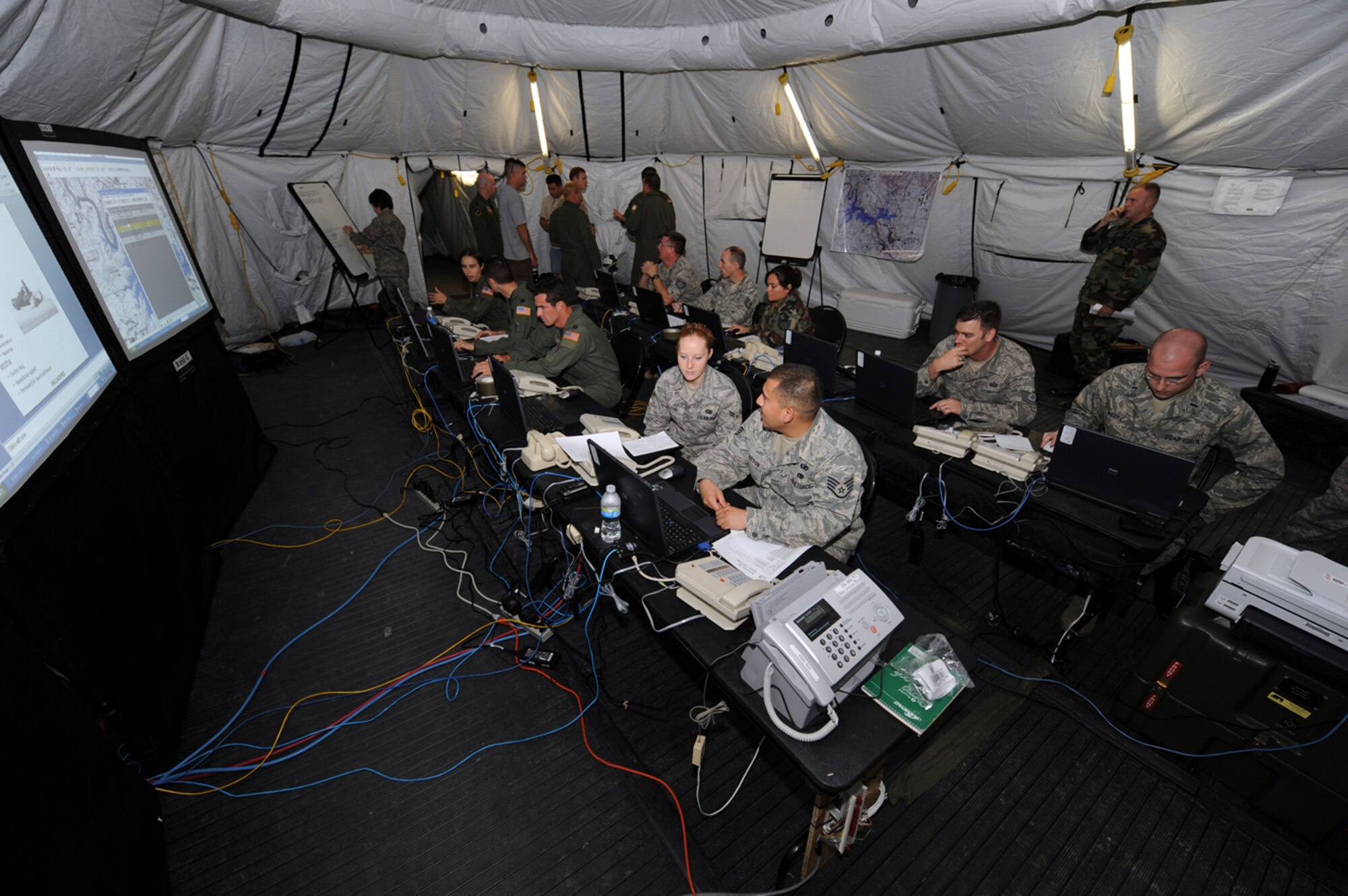 Members of the Rescue Operations Center stand ready to provide command and control June 3 for Exercise Resolute Angel at Laughlin Air Force Base, Texas. The exercise was conducted in preparation for the upcoming hurricane season. (U.S. Air Force Photo/Master Sgt. Heather Cabral)