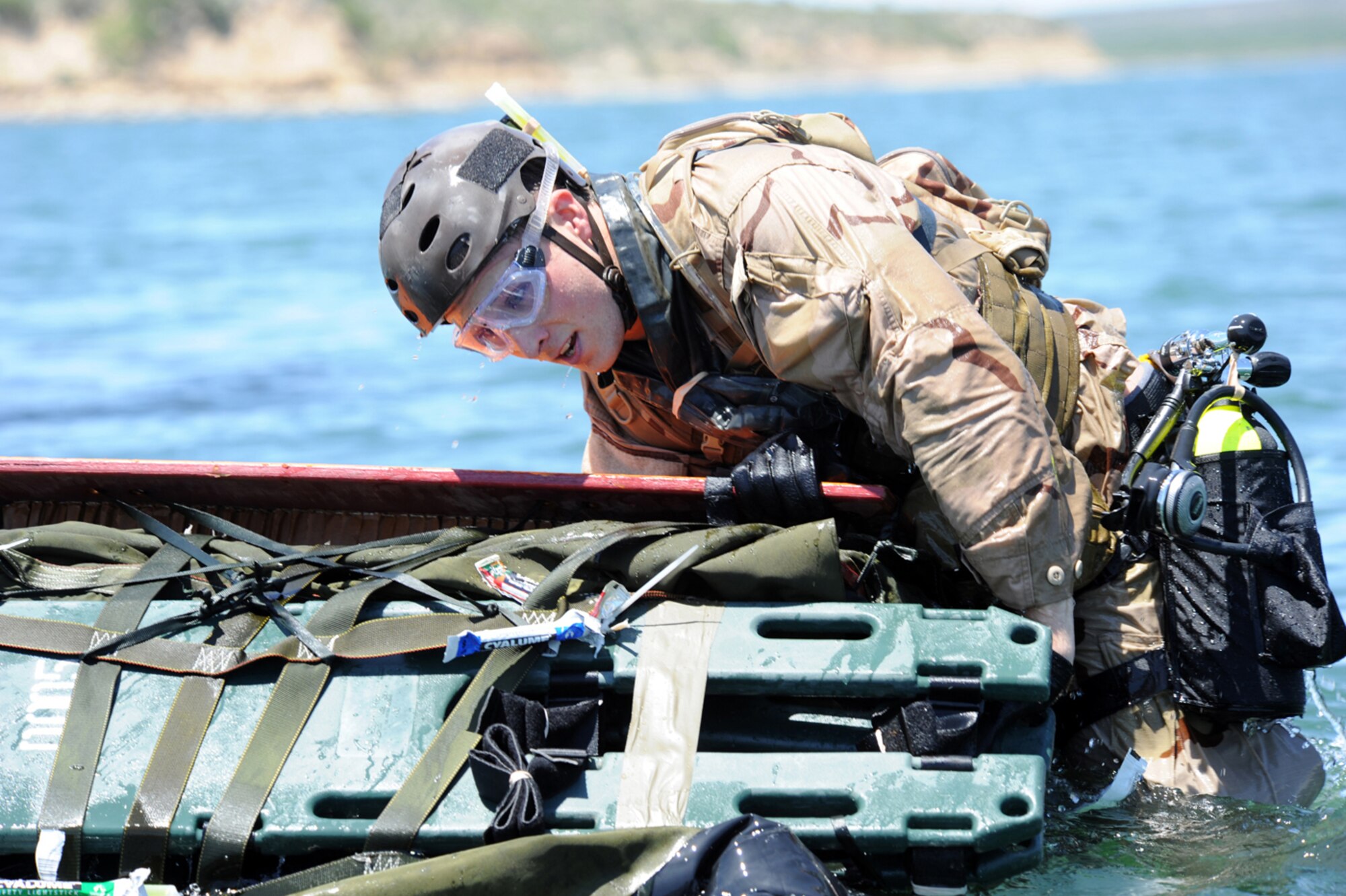 Senior Airman Douglas Dicken of the 48th Rescue Sqadron prepares to deploy the Rigged Alternate Method Zodiac after jumping from an HC-130P Hercules during Exercise Resolute Angel. The exercise, hosted by Laughlin Air Force Base, Texas, was conducted May 29 to June 4 in preparation for the upcoming hurricane season. (U.S. Air Force Photo/Master Sgt. Heather Cabral)