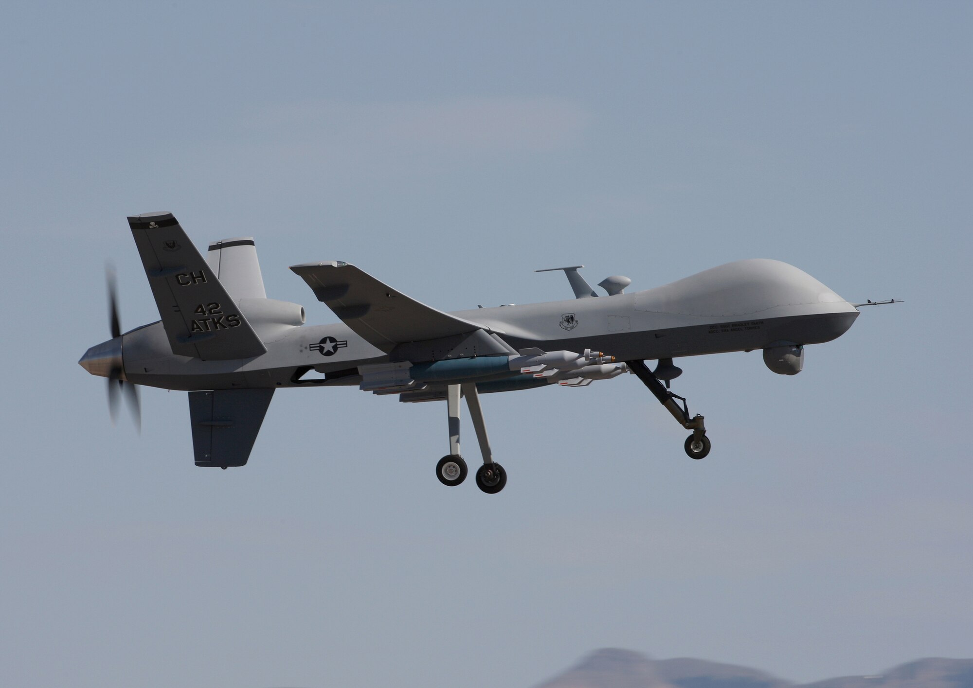 A MQ-9 Reaper flies above Creech AFB during a local training mission. The 42nd Attack Squadron currently operates the MQ-9.  (Photo by Paul Ridgeway)