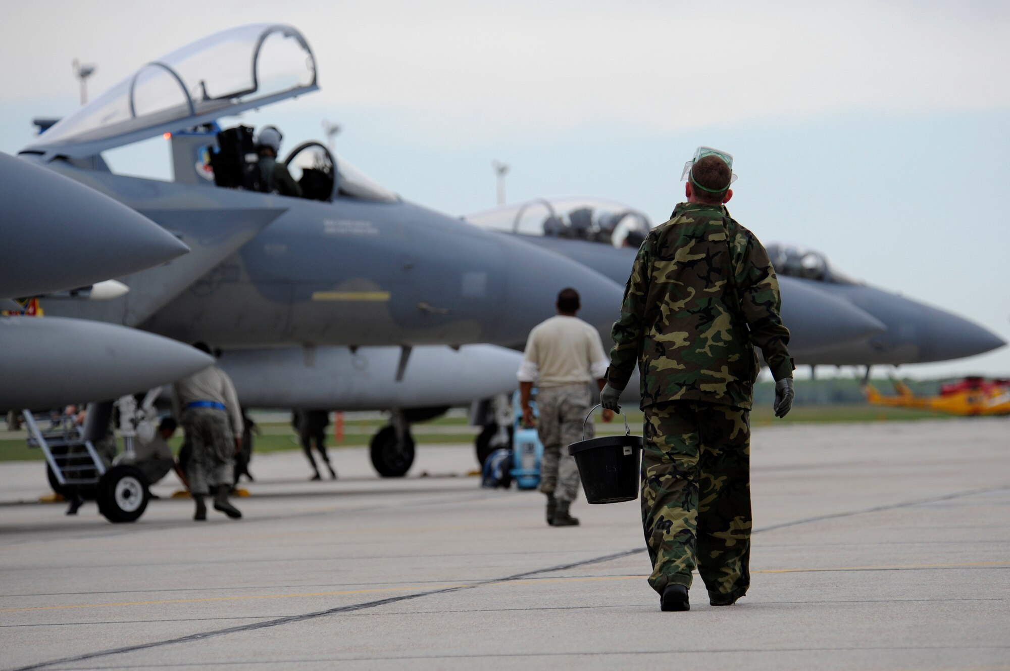 WING COLD LAKE, Alberta - Staff Sgt. Kyle Harbison, 390th Aircraft Maintenance Unit F-15C Eagle specialist, prepares to scavenge extra fuel from the aircraft after the arrival of the 390th Fighter Squadron to participate in exercise Maple Flag 42 at Wing Cold Lake, Alberta, May 30. Maple Flag is a Canadian-sponsored and Air Combat Command supported exercise providing aircrews simulated air and ground combat training to coalition forces in a NATO environment. (U.S. Air Force photo/Senior Airman Larry E. Reid Jr.)