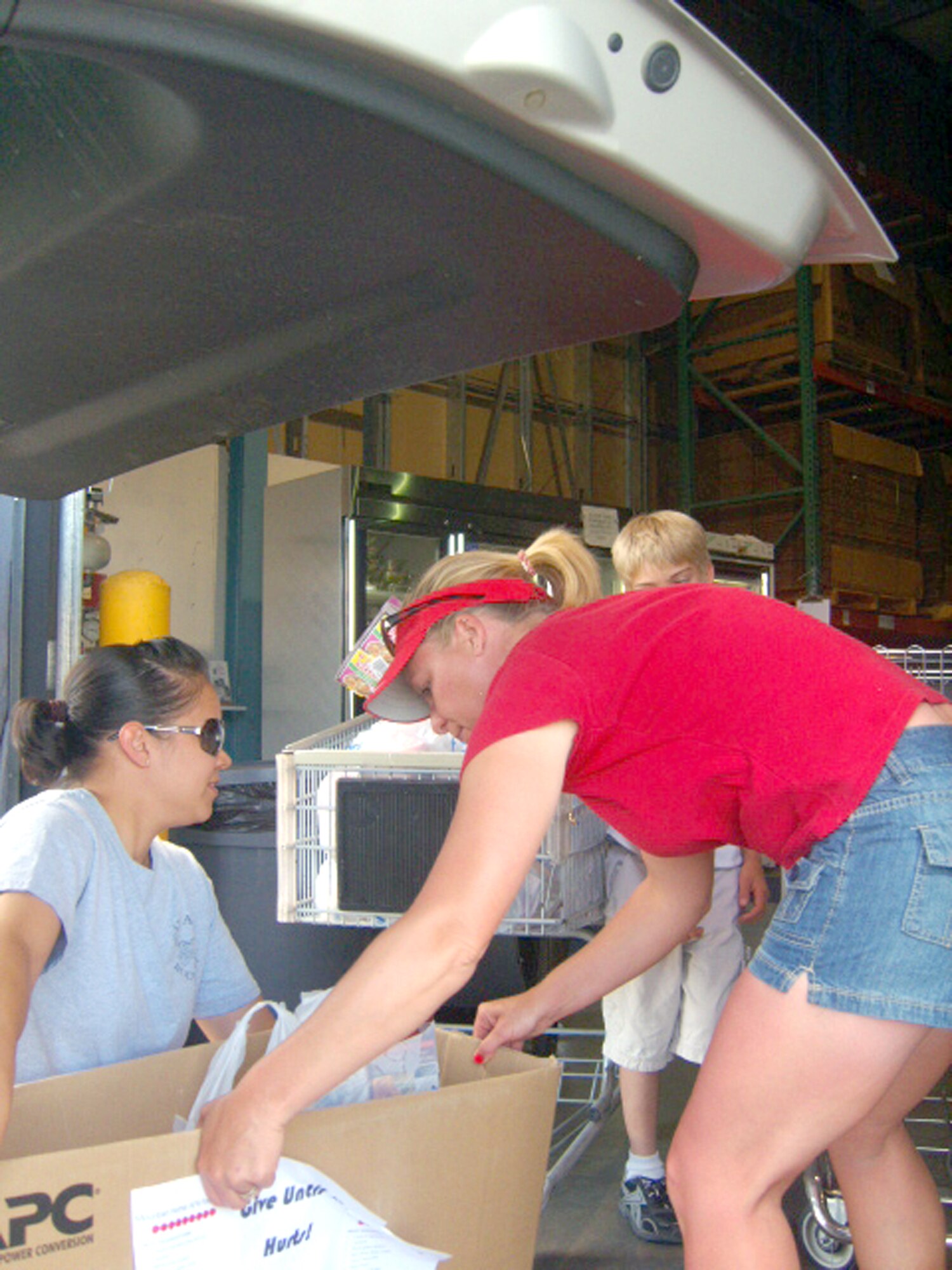 MOUNTAIN HOME AIR FORCE BASE, Idaho – Staff Sgt. Jessica Rosario-Styles, 366th Logistics Readiness Squadron, and Rose Villareal, spouse of Master Sgt. William Villareal, 366th LRS, deliver some of the more than 1,600 pounds in food donations for the Idaho Food Bank in Boise, Idaho. The 366th Mission Support Group held a food drive from May 18 to 30 with a goal to help out as many people as possible. Several people in the group were collecting donations from their respective squadrons, and the drive ended with an all-day donation drive at the Mountain Home Albertson's and Wal-Mart where 50 volunteers from the group came out and accepted donations from the local community. The food drive raised more than $240 and 1,600 pounds in food for the Idaho Food Bank in Boise, Idaho. (U.S. Air Force photo\ Master Sgt. William Villareal)