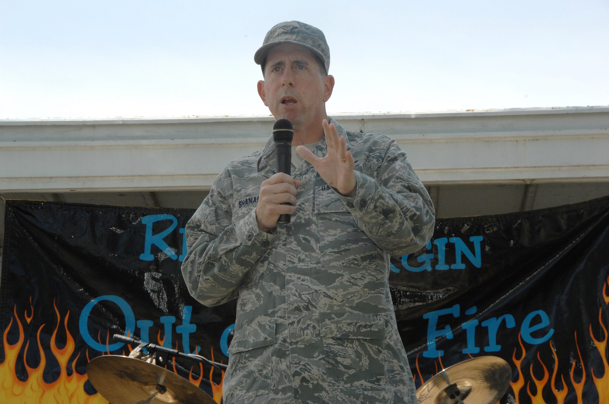 OFFUTT AIR FORCE BASE, Neb. -- 55th Wing Commmander Col. John N.T. Shanahan, addresses thousands of picnic goers at the 15th annual Offutt Appreciation Picnic at the Base Lake June 5. Picnic attendees enjoyed free food, children's rides and prize giveaways. U.S. Air Force Photo by D.P. HeardU.S. Air Force Photo by D.P. Heard