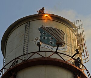 LANGLEY AIR FORCE BASE, Va. -- Contractors begin to tear down the water tower near senior non-commissioned officer housing June 7.  This water tower was built in 1930, but due to deterioration it has not been used since 2004, and is no longer required in the water distribution system. (U.S. Air Force photo/Senior Airman Zachary Wolf)

