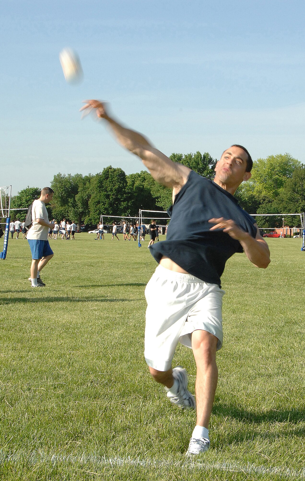 OFFUTT AIR FORCE BASE, Neb. -- Staff Sgt. Byron Lawson, 55th Operations Support Squadron, unleashes one of his distance throws at the softball toss competition during the Offutt Sports Day at the parade grounds June 5. All base agencies competed in activities including tug-of-war, 110-yard dash and ultimate frisbee. Trophies were presented to the top 3 points gaining units from the combined events during the Offutt Appreciation Day picnic at the Base Lake later that day.
U.S. Air Force Photo by D.P. Heard
