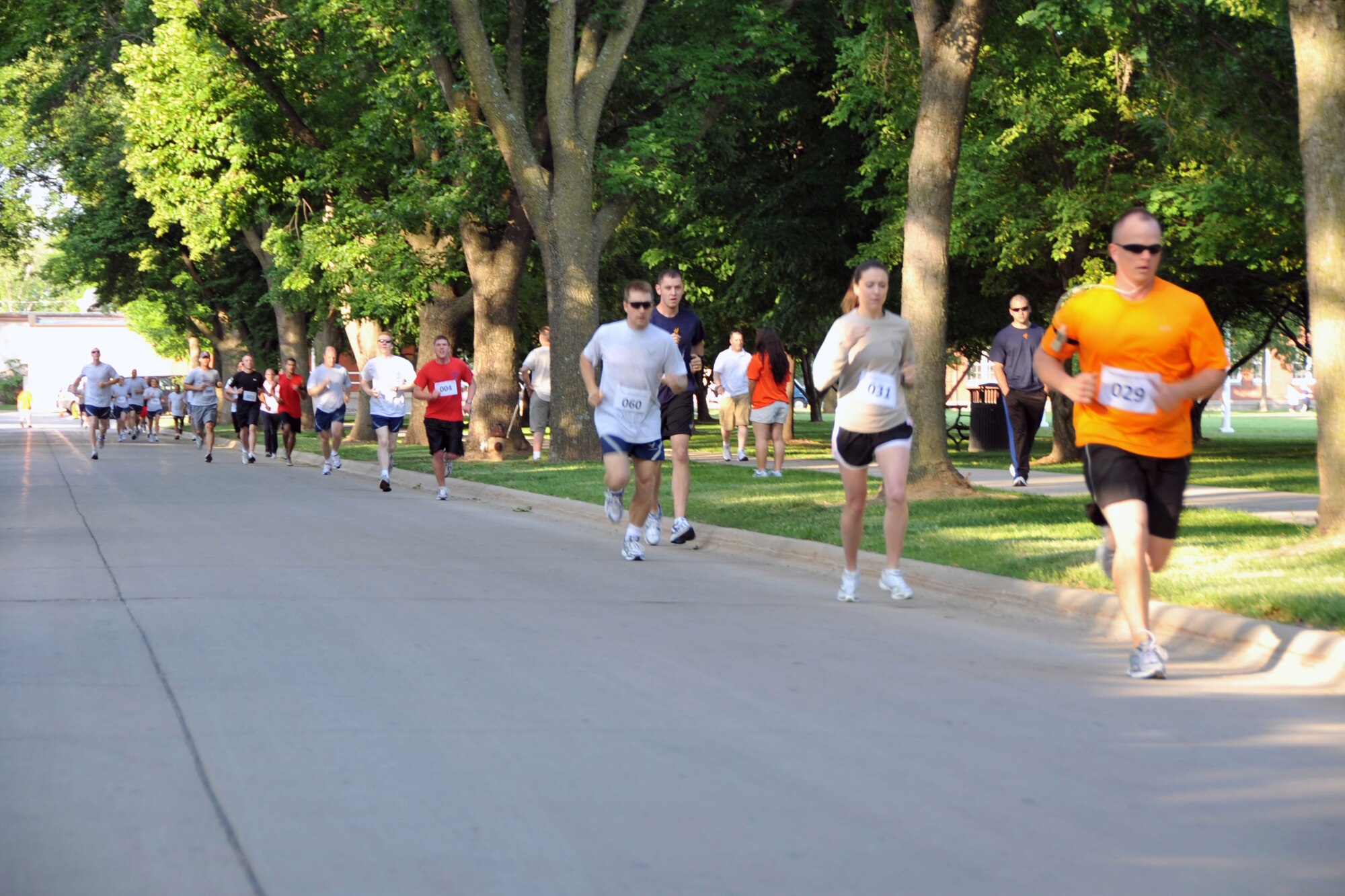 OFFUTT AIR FORCE BASE, Neb. -- Runners complete a 5k during one of the Offutt Sports Day activities June 5. The day included tug-of-war, 110-yard dash and ultimate frisbee. Trophies were presented to the top 3 units to finish from the combined event.
U.S. Air Force photo by Jeff W. Gates