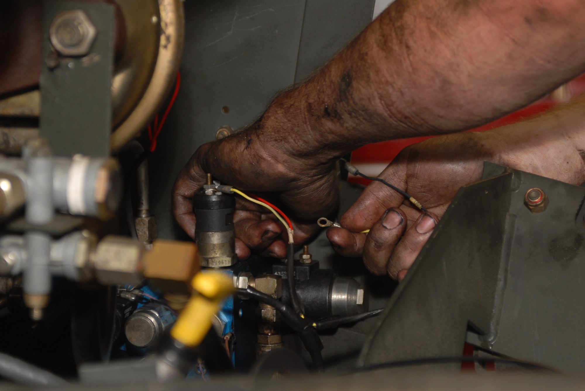 Airman 1st Class Jeffrey Seastrand, a 19th Logistics Readiness Squadron special purpose apprentice, overhauls the hydraulic system of a MB4 engine at Little Rock Air Force Base, Ark. June 8, 2009. The 19th LRS’s small vehicle maintenance team broke a record by sustaining a 96.2 percent mission capable rate for the month of March, the best mark seen in 20 years and best in Air Mobility Command. (U.S. Air Force photo by Senior Airman Nathan Allen)