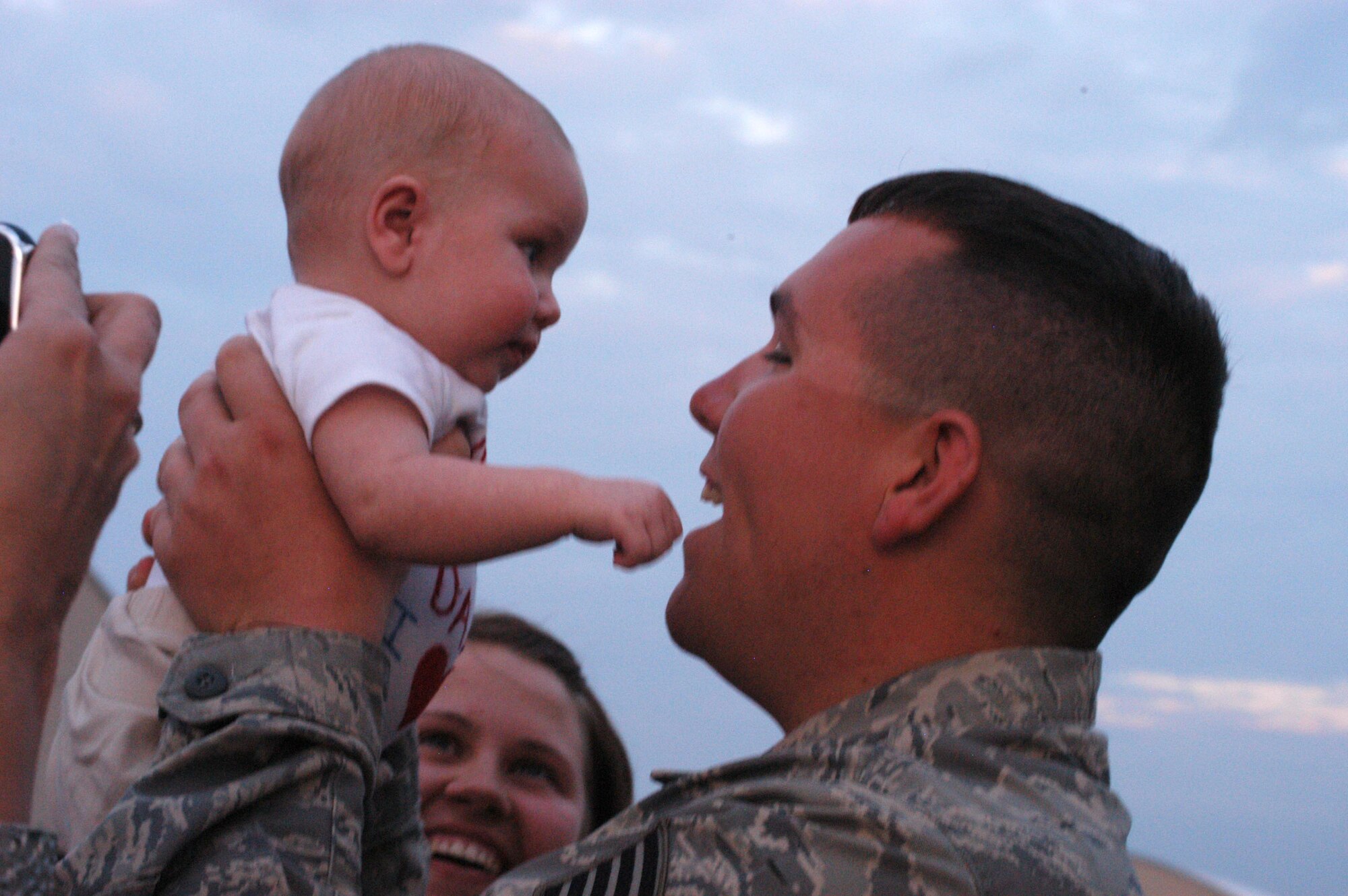 Staff Sgt Tim Cloud, a member of the 301st Maintenance Squadron was overjoyed to meet his new son when he returned home May 22. Various members from units of the 301st Fighter Wing returned from a six-month deployment in support of OPERATION ENDURING FREEDOM. (U.S. Air Force photo/Maj Karl Lewis)