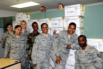 HOMESTEAD AIR RESERVE BASE, Fla. - Members of the 482nd Fighter Wing Military Personnel Flight (MPF), stand in front of 40 boxes containing over 1,600 unit personnel group folders prior to shipment to the Air Reserve Personnel Center on June 3.  The MPF conducted an extensive three month audit of records removing extraneous items prior to them being digitally scanned into the Personnel Records Display Application (PRDA).  Personnel wishing to access their records from PRDA may do so in approximately 30-days via the Air Force Portal.  For more information, contact the MPF at (305) 224-7057.  (U.S. Air Force photo/Tim Norton)