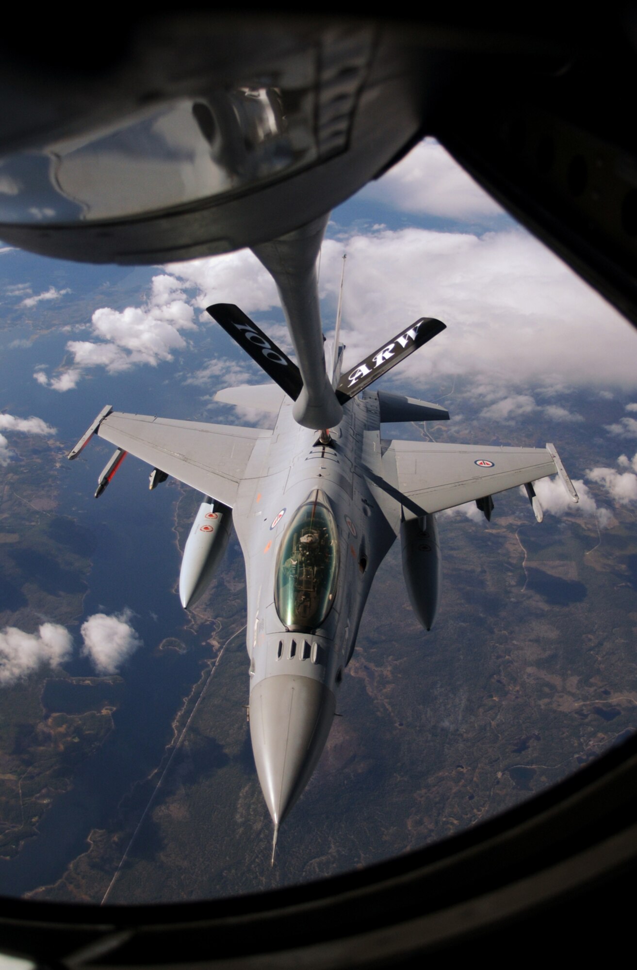 A Norwegian F-16 receives fuel from a 100th Air Refueling Wing KC-135 over Sweden during Loyal Arrow 2009.  The 10-day NATO exercise has more than 1,000 participants from 10 different countries, including Sweden, Poland, Germany, Italy and the United States.  United States Air Forces in Europe deployed teams from RAFs Midenhall and Lakenheath and Ramstein Air Base to Sweden to participate in the operation.  (U.S. Air Force photo by Staff Sgt. Austin M. May)
