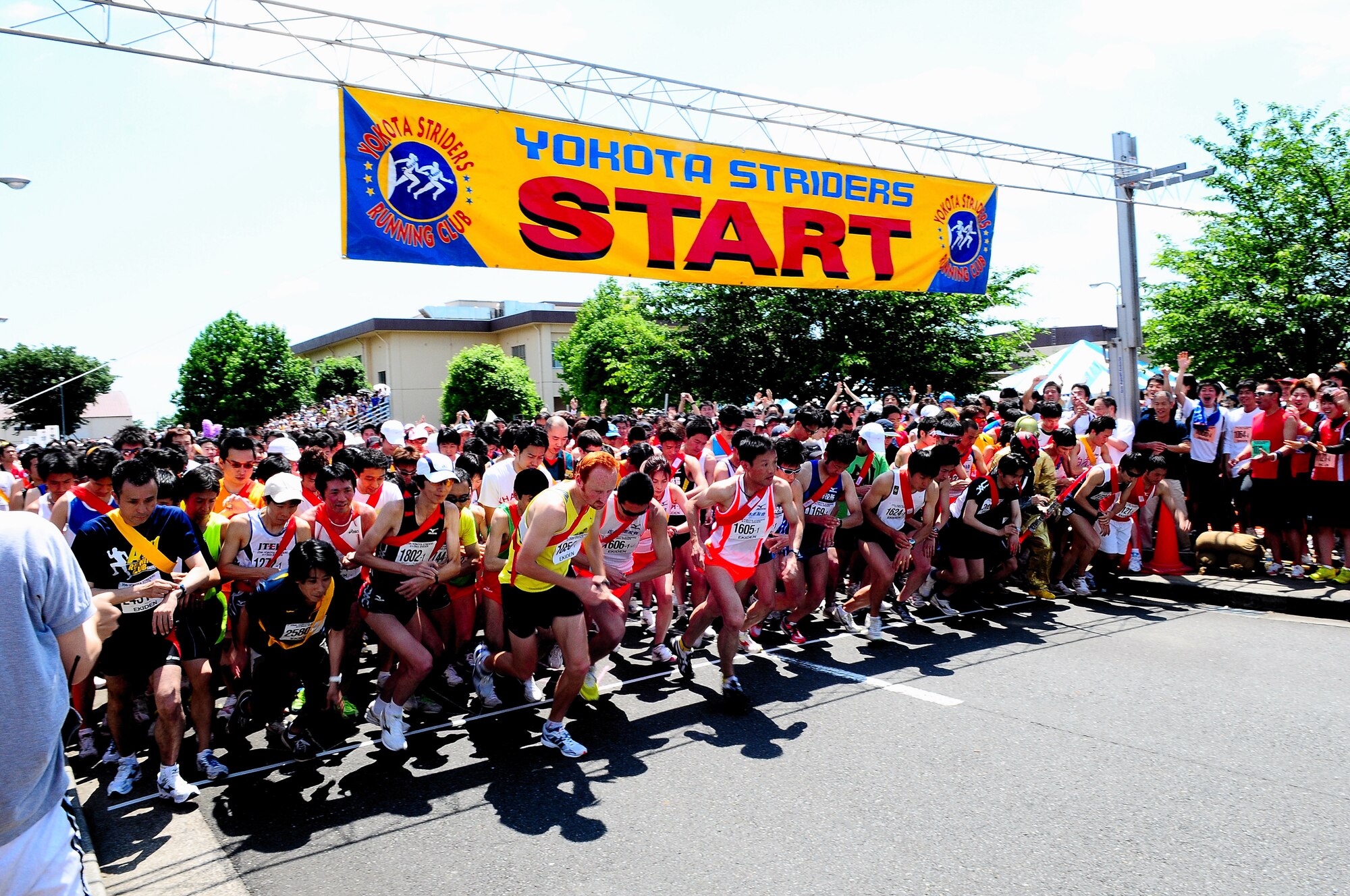 YOKOTA AIR BASE, Japan – Runners begin the 5Kx4 race during the 25th Annual Yokota Striders Ekiden, June 7. The 5Kx4 race was one of three races held that day. More than 9,800 people attended the event this year. (Air Force photo/Airman 1st Class Michael Dillon)