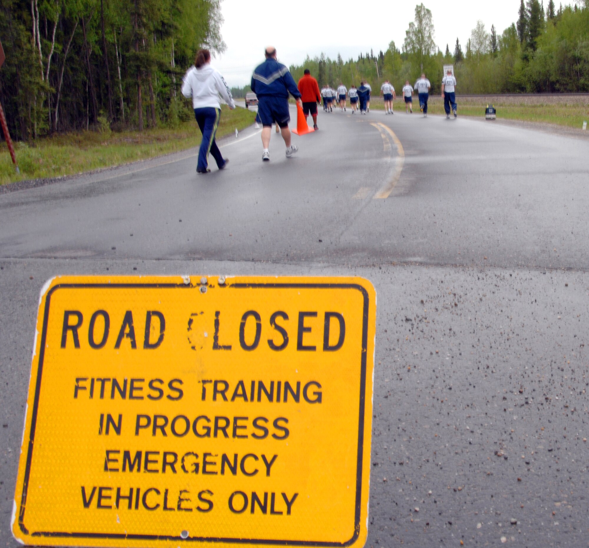 Airmen prepare for the 1.5 mile run of their physical training test June 1, 2009, Eielson Air Force Base, Alaska. The aerobic run will now account for 60 percent of the test.