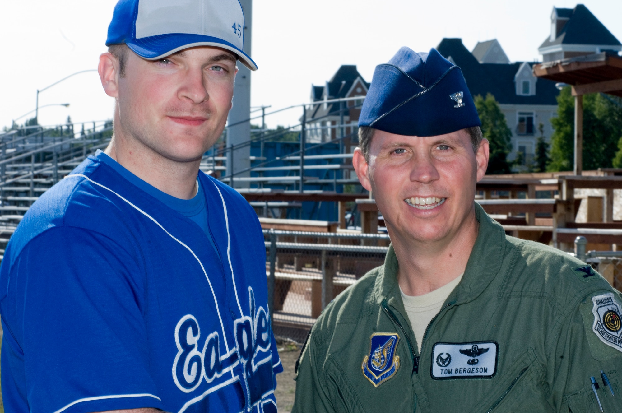 ANCHORAGE, Alaska -- Sean Shelton, 3rd Civil Engineer Squadron, right fielder for the Elmendorf Eagles, poses with Col. Thomas Bergeson, 3rd Wing commander, for a photo before the military appreciation baseball game. The military appreciation baseball game was between the Anchorage Bucs and the Elmendorf Eagles. (U.S. Air Force photo/ Airman Jack Sanders)