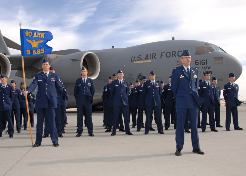 Lieutenant Colonel Joel Jackson, 6th Air Refueling Squadron commander (front), stands at parade rest prior to the 60th Operation Support Group change of command June 1st 2009.  The ceremony took place at Travis Air Force Base, California. (U.S. Air Force photo by Civ/Nan Wylie)