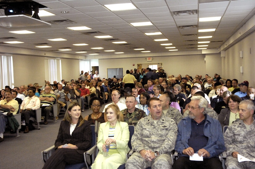 More than 500 Army employees listen to a June 4 presentation on Fort Dix that summarized the challenges and opportunities facing McGuire Air Force Base, Fort Dix and the Naval Air Engineering Station Lakehurst, N.J., as the three installations gear up for "full operating capability" on Oct. 1, when real property and funds are set to transfer to Air Force control. (U.S. Army photo/Wayne Cook)