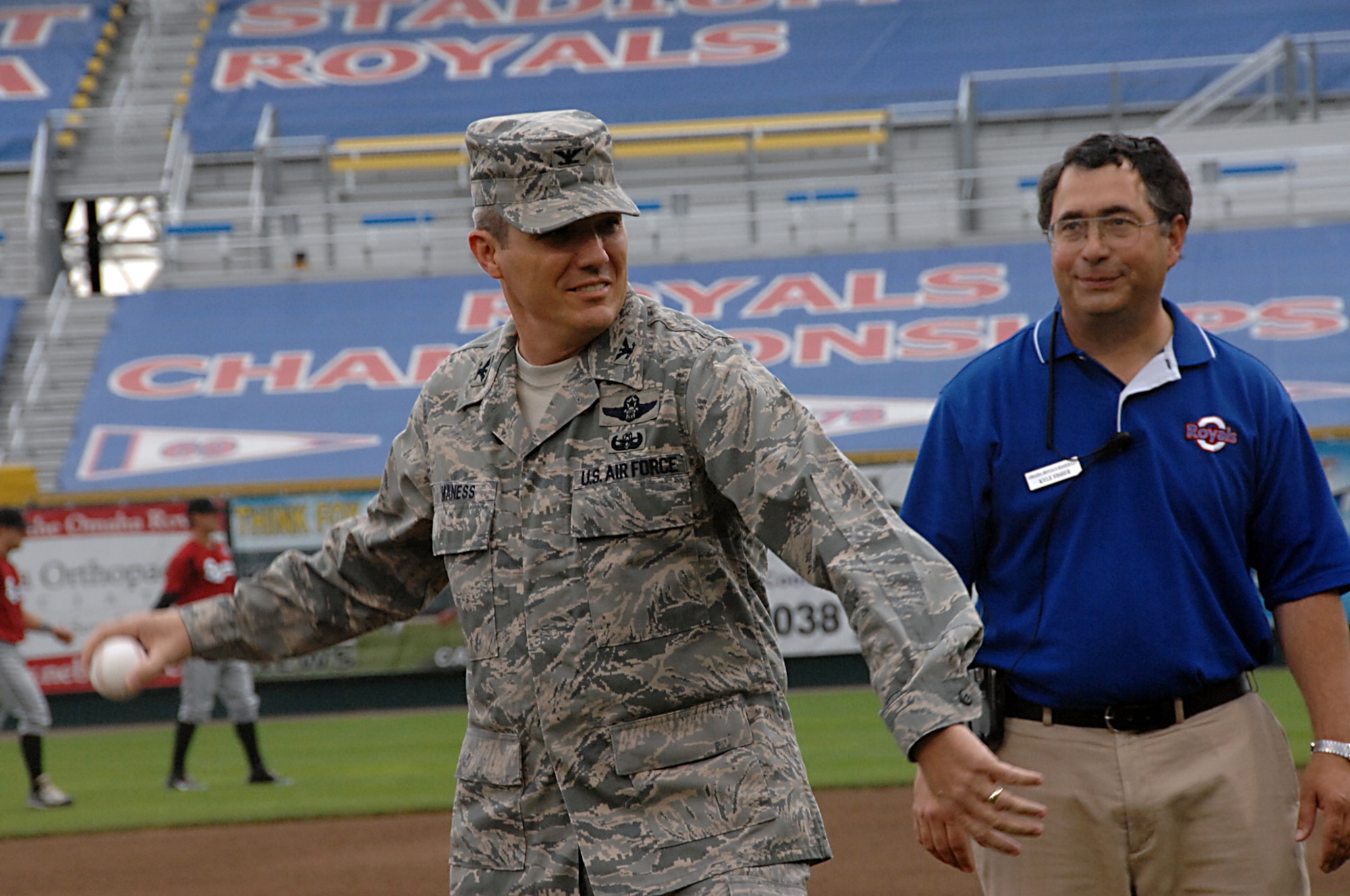 OFFUTT AIR FORCE BASE, Neb. -- Col. Robert L. Manness, 55th Wing vice commander, throws out a ceremonial first pitch before the Omaha Royals Military Appreciation Game at Rosenblat stadium June 7. U.S. Air Force Photo by Kendra Williams
