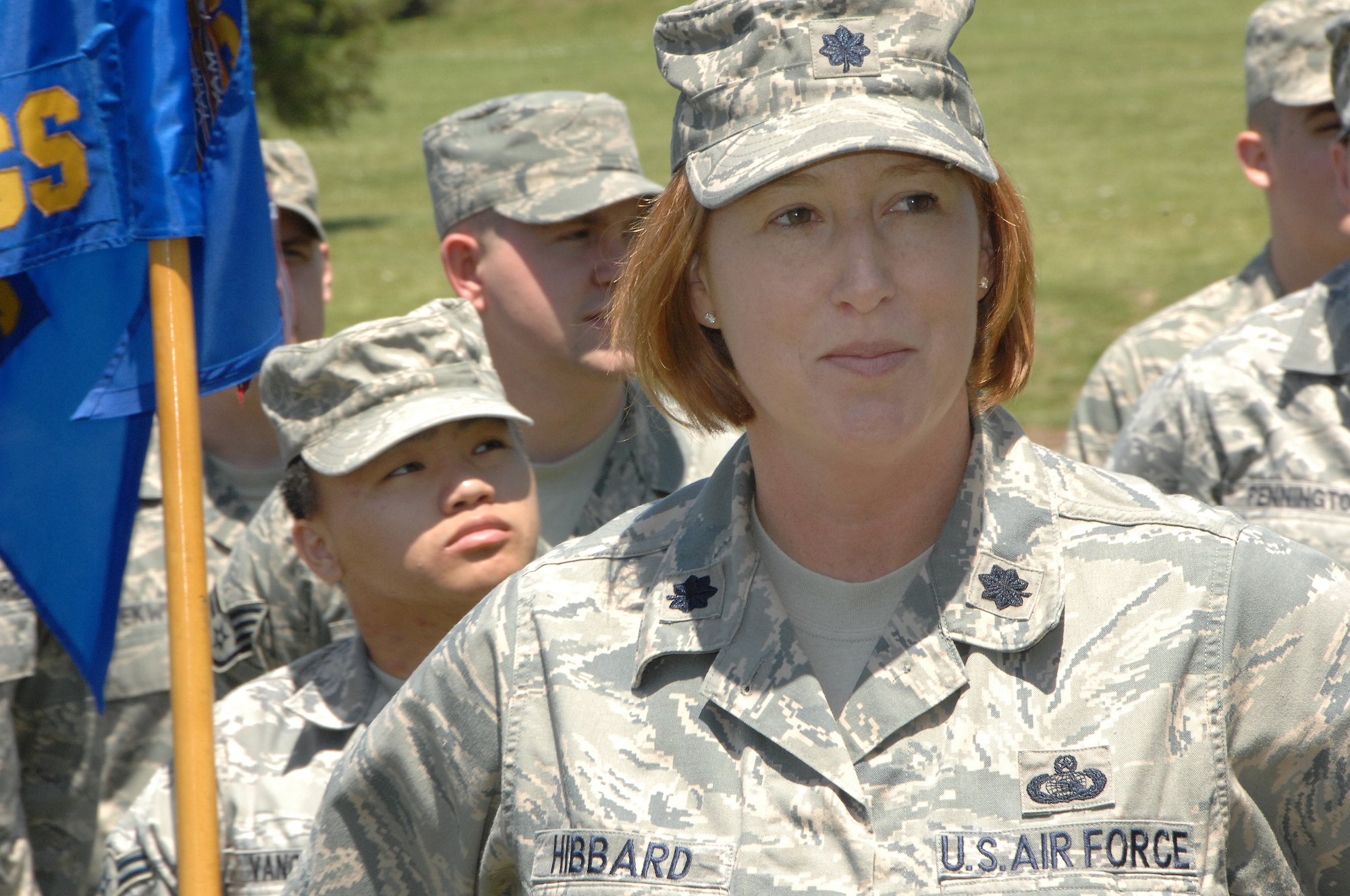 OFFUTT AIR FORCE BASE, Neb. -- Lt. Col. Karen J. Hibbard, 55th Strategic Communications Squadron commander and several members of the 55th SCS look on as the unit's placard is placed under the three-year mark on the DUI awareness board inside the Kenney Gate June 4. The 55th SCS is one of seven units who've been DUI free for three years or more. U.S. Air Force Photo by Mr. D.P. Heard