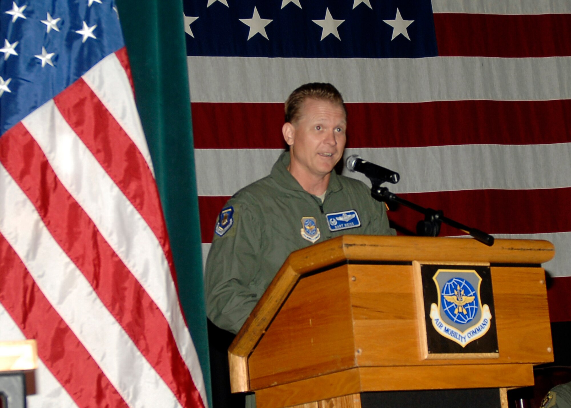 MCCONNELL AIR FORCE BASE, Kan. -- Col. Bart Weiss, 22nd Operations Group commander, bids farewell during the Operations Group change of command ceremony at the Robert J. Dole Community Center ballroom, June 5. Colonel Weiss has now assumed the position of the 22nd Air Refueling Wing vice commander. (Photo by Senior Airman Anthony Mejia)