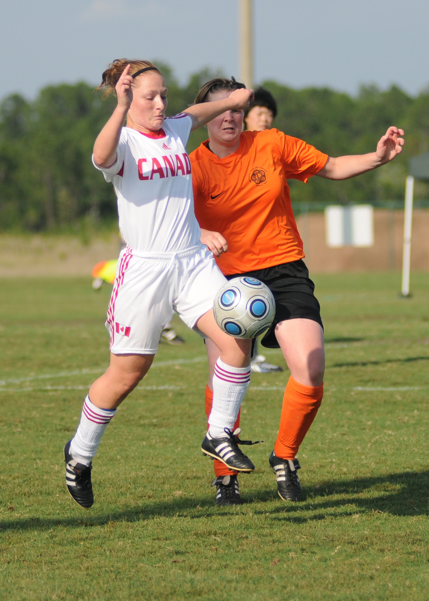 The Netherlands  and Canada compete during the 5th CISM Women’s Soccer Championship at the Gulfport Sports Complex 9 June.  The CISM tournament, hosted by Keesler Air Force Base, includes teams from Brazil, Canada, France, Germany, The Netherlands, The Republic of South Korea and the United States.  Matches are being held June 6 to 13, with the Gold match June 13 at 2 p.m.  Organizers say the tournament gives teams and people who attend a chance to develop bonds and life-long friendships between the countries and a chance to learn about one another’s cultural similarities and differences.  (U.S. Air Force photo by Kemberly Groue)