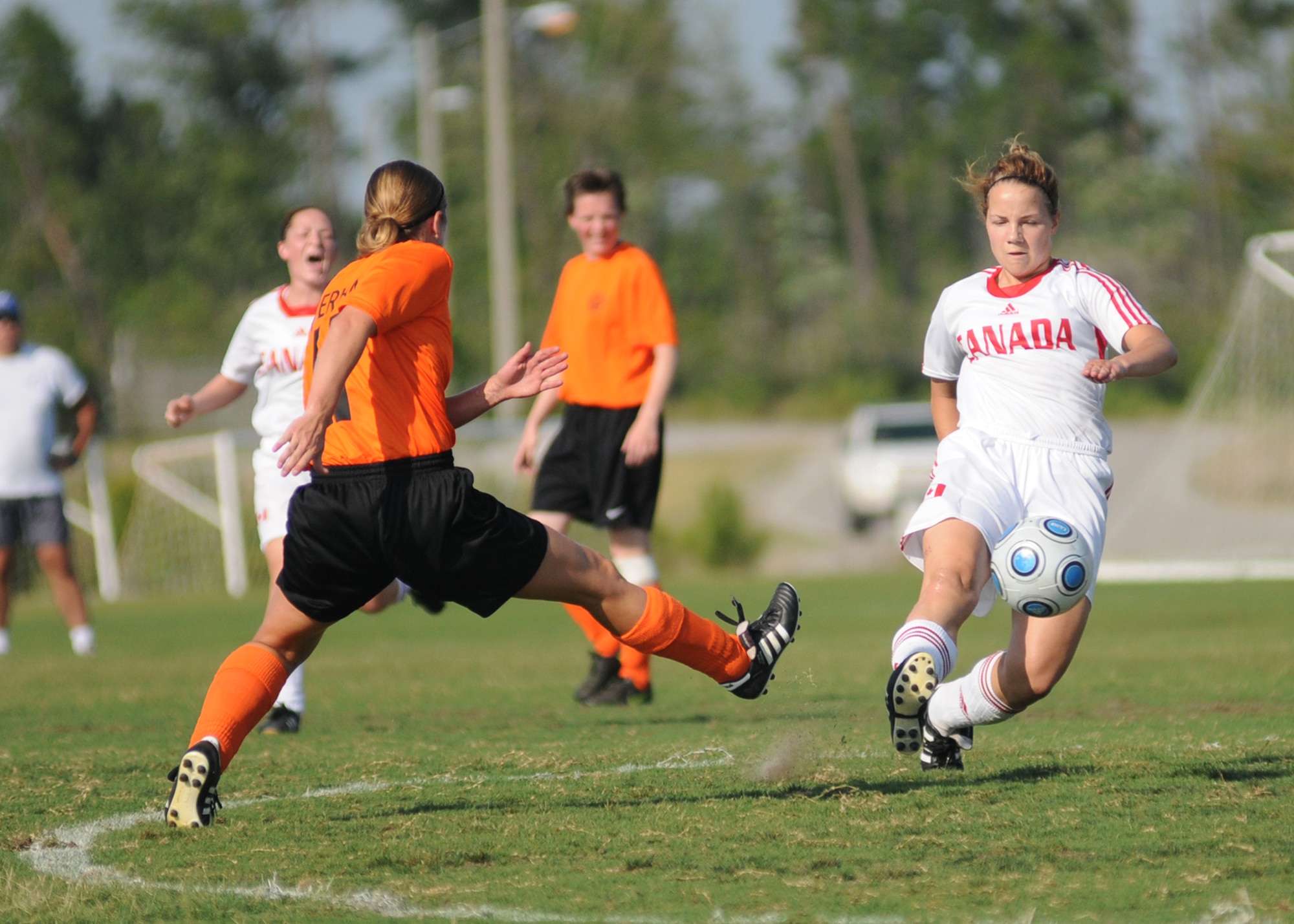 The Netherlands  and Canada compete during the 5th CISM Women’s Soccer Championship at the Gulfport Sports Complex 9 June.  The CISM tournament, hosted by Keesler Air Force Base, includes teams from Brazil, Canada, France, Germany, The Netherlands, The Republic of South Korea and the United States.  Matches are being held June 6 to 13, with the Gold match June 13 at 2 p.m.  Organizers say the tournament gives teams and people who attend a chance to develop bonds and life-long friendships between the countries and a chance to learn about one another’s cultural similarities and differences.  (U.S. Air Force photo by Kemberly Groue)
