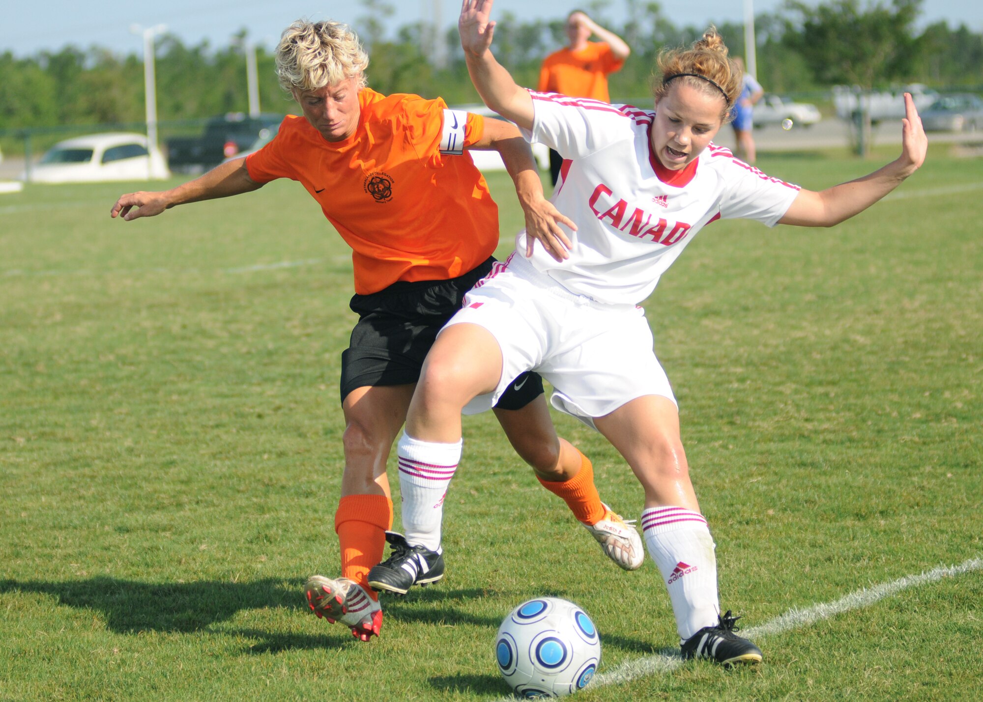 The Netherlands  and Canada compete during the 5th CISM Women’s Soccer Championship at the Gulfport Sports Complex 9 June.  The CISM tournament, hosted by Keesler Air Force Base, includes teams from Brazil, Canada, France, Germany, The Netherlands, The Republic of South Korea and the United States.  Matches are being held June 6 to 13, with the Gold match June 13 at 2 p.m.  Organizers say the tournament gives teams and people who attend a chance to develop bonds and life-long friendships between the countries and a chance to learn about one another’s cultural similarities and differences.  (U.S. Air Force photo by Kemberly Groue)