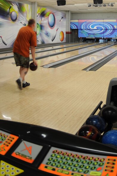 BARKSDALE AIR FORCE BASE, La. -- Active duty military, retired military, DOD civilian employees, dependants, and civilian contractors participate in the Battle of the Booster Club bowling completion. The competition began on June 4 and is held every Thursday at 6 p.m. (U.S. Air Force photo by Airman 1st Class Brittany Y. Bateman)