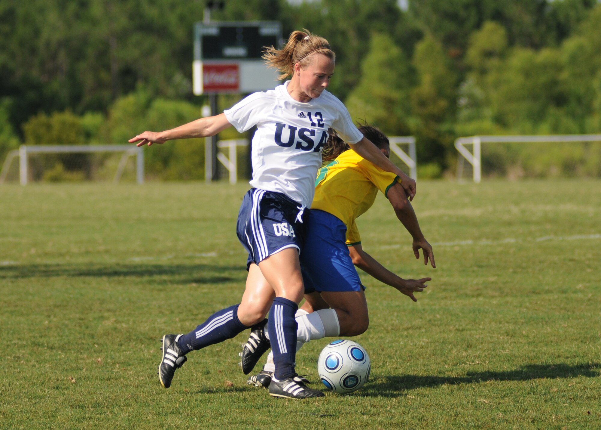 Brazil and the United States compete during the 5th CISM Women’s Soccer Championship at the Gulfport Sports Complex 9 June.  The CISM tournament, hosted by Keesler Air Force Base, includes teams from Brazil, Canada, France, Germany, The Netherlands, The Republic of South Korea and the United States.  Matches are being held June 6 to 13, with the Gold match June 13 at 2 p.m.  Organizers say the tournament gives teams and people who attend a chance to develop bonds and life-long friendships between the countries and a chance to learn about one another’s cultural similarities and differences.  (U.S. Air Force photo by Kemberly Groue)