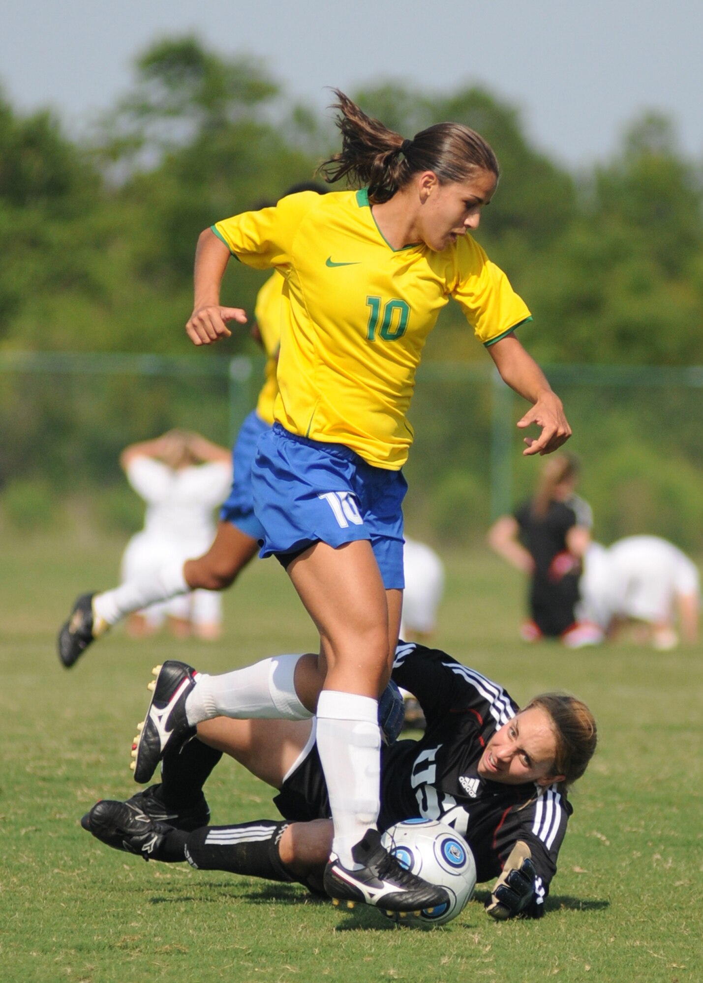 Brazil and the United States compete during the 5th CISM Women’s Soccer Championship at the Gulfport Sports Complex 9 June.  The CISM tournament, hosted by Keesler Air Force Base, includes teams from Brazil, Canada, France, Germany, The Netherlands, The Republic of South Korea and the United States.  Matches are being held June 6 to 13, with the Gold match June 13 at 2 p.m.  Organizers say the tournament gives teams and people who attend a chance to develop bonds and life-long friendships between the countries and a chance to learn about one another’s cultural similarities and differences.  (U.S. Air Force photo by Kemberly Groue)