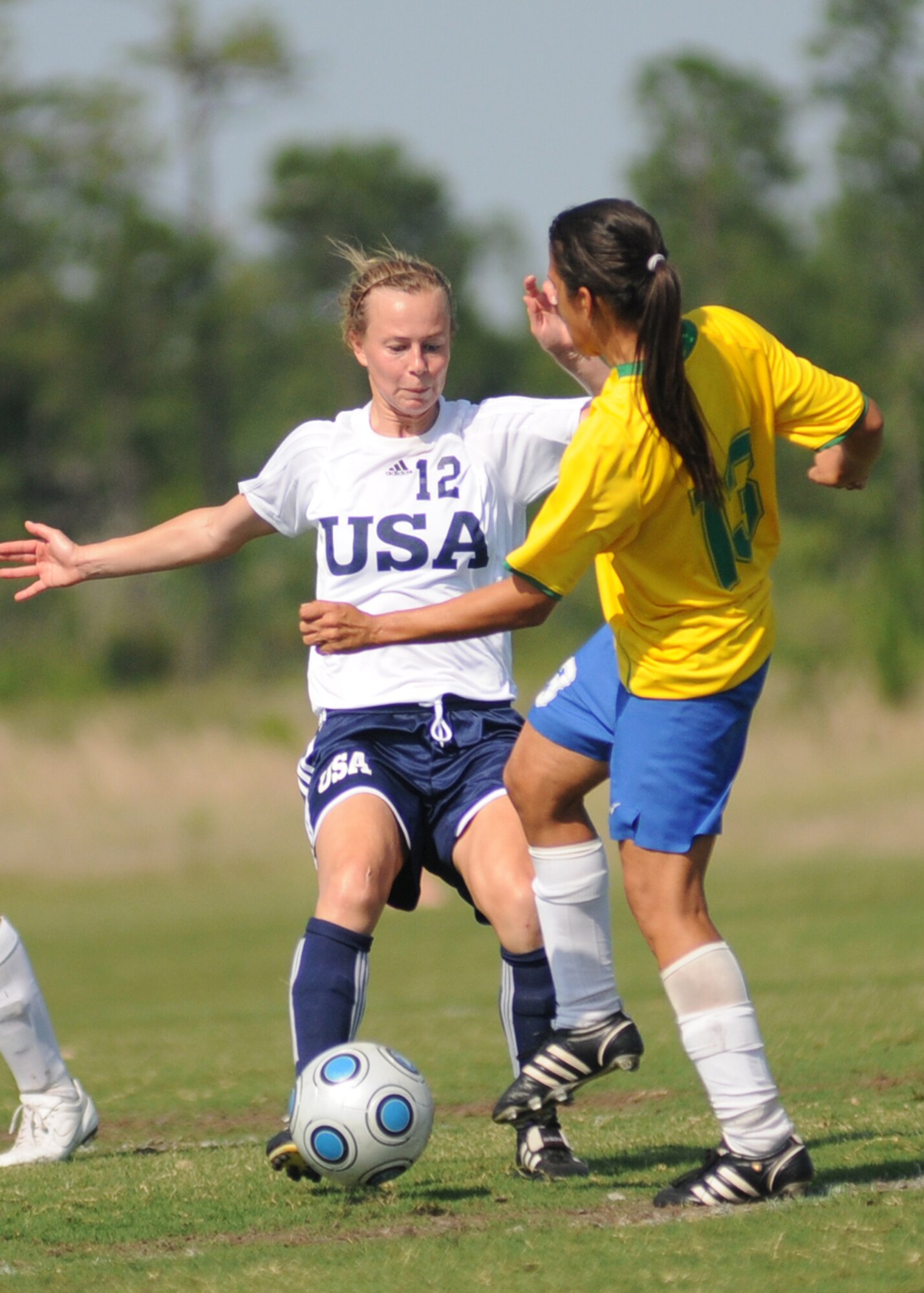 Brazil and the United States compete during the 5th CISM Women’s Soccer Championship at the Gulfport Sports Complex 9 June.  The CISM tournament, hosted by Keesler Air Force Base, includes teams from Brazil, Canada, France, Germany, The Netherlands, The Republic of South Korea and the United States.  Matches are being held June 6 to 13, with the Gold match June 13 at 2 p.m.  Organizers say the tournament gives teams and people who attend a chance to develop bonds and life-long friendships between the countries and a chance to learn about one another’s cultural similarities and differences.  (U.S. Air Force photo by Kemberly Groue)