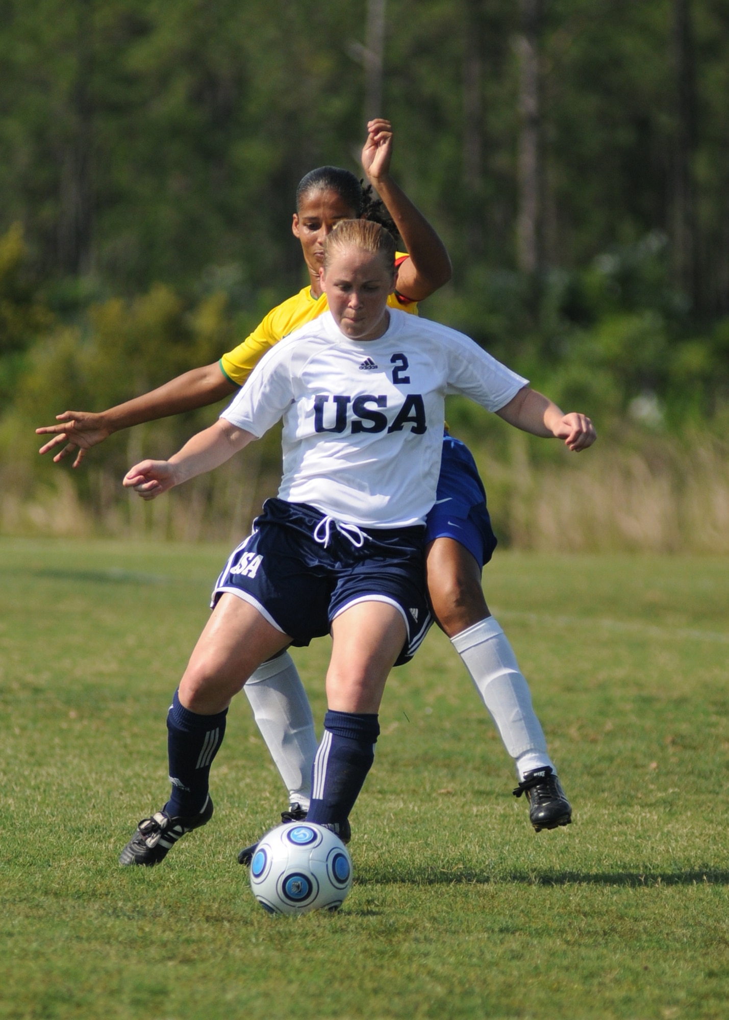 Brazil and the United States compete during the 5th CISM Women’s Soccer Championship at the Gulfport Sports Complex 9 June.  The CISM tournament, hosted by Keesler Air Force Base, includes teams from Brazil, Canada, France, Germany, The Netherlands, The Republic of South Korea and the United States.  Matches are being held June 6 to 13, with the Gold match June 13 at 2 p.m.  Organizers say the tournament gives teams and people who attend a chance to develop bonds and life-long friendships between the countries and a chance to learn about one another’s cultural similarities and differences.  (U.S. Air Force photo by Kemberly Groue)