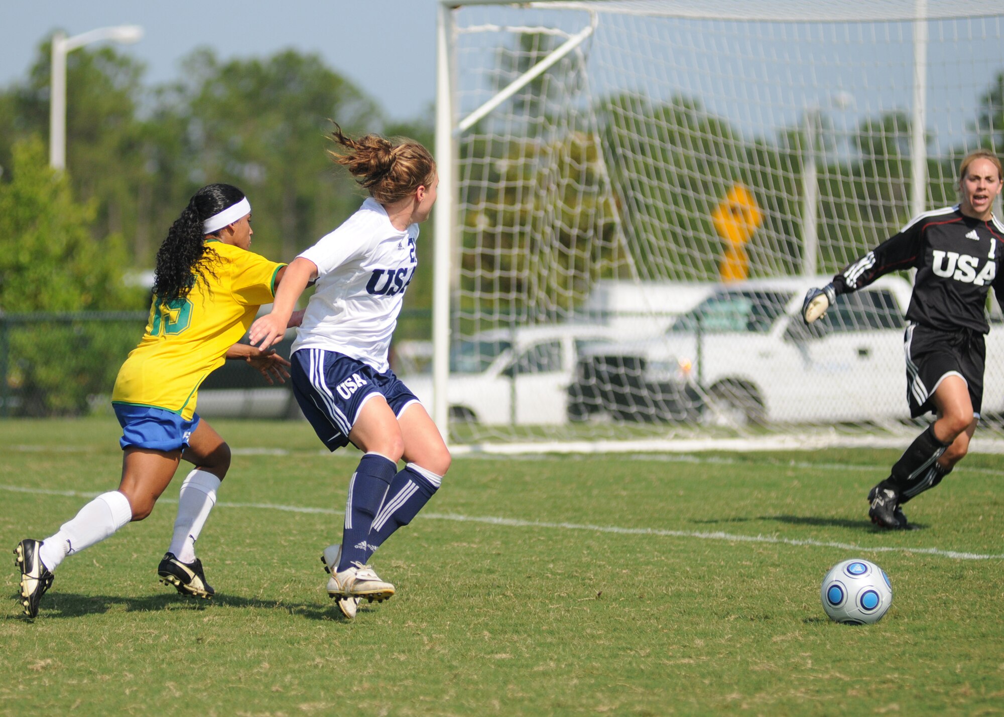 Brazil and the United States compete during the 5th CISM Women’s Soccer Championship at the Gulfport Sports Complex 9 June.  The CISM tournament, hosted by Keesler Air Force Base, includes teams from Brazil, Canada, France, Germany, The Netherlands, The Republic of South Korea and the United States.  Matches are being held June 6 to 13, with the Gold match June 13 at 2 p.m.  Organizers say the tournament gives teams and people who attend a chance to develop bonds and life-long friendships between the countries and a chance to learn about one another’s cultural similarities and differences.  (U.S. Air Force photo by Kemberly Groue)