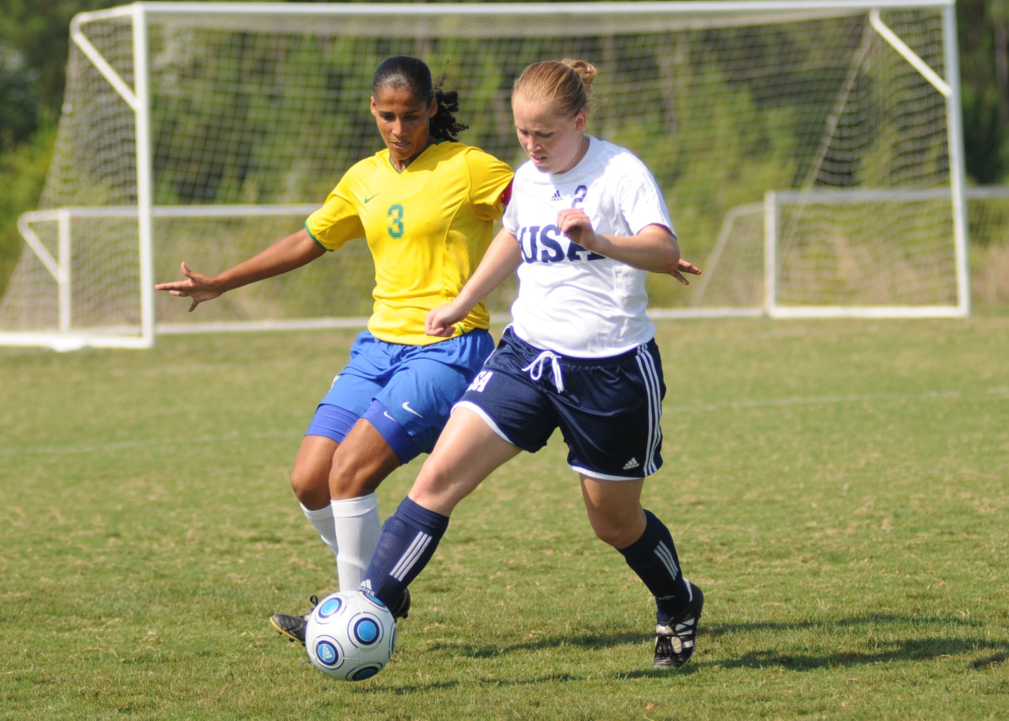 Brazil and the United States compete during the 5th CISM Women’s Soccer Championship at the Gulfport Sports Complex 9 June.  The CISM tournament, hosted by Keesler Air Force Base, includes teams from Brazil, Canada, France, Germany, The Netherlands, The Republic of South Korea and the United States.  Matches are being held June 6 to 13, with the Gold match June 13 at 2 p.m.  Organizers say the tournament gives teams and people who attend a chance to develop bonds and life-long friendships between the countries and a chance to learn about one another’s cultural similarities and differences.  (U.S. Air Force photo by Kemberly Groue)