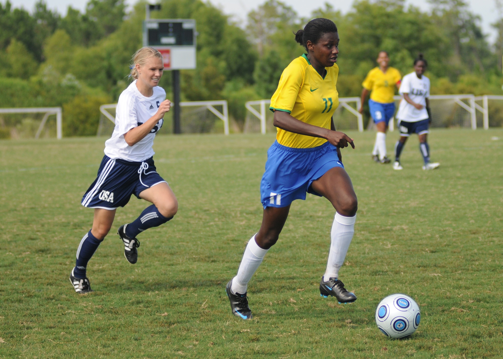 Brazil and the United States compete during the 5th CISM Women’s Soccer Championship at the Gulfport Sports Complex 9 June.  The CISM tournament, hosted by Keesler Air Force Base, includes teams from Brazil, Canada, France, Germany, The Netherlands, The Republic of South Korea and the United States.  Matches are being held June 6 to 13, with the Gold match June 13 at 2 p.m.  Organizers say the tournament gives teams and people who attend a chance to develop bonds and life-long friendships between the countries and a chance to learn about one another’s cultural similarities and differences.  (U.S. Air Force photo by Kemberly Groue)