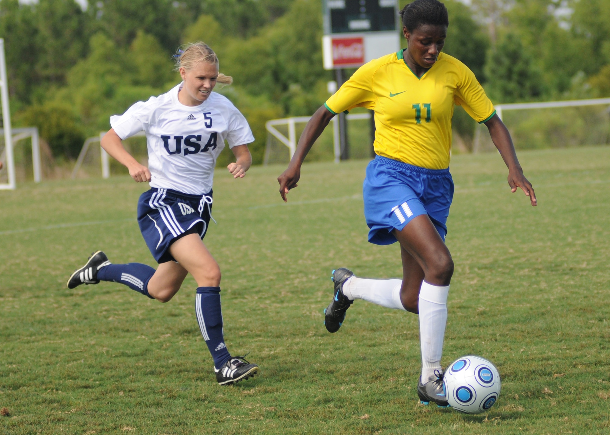 Brazil and the United States compete during the 5th CISM Women’s Soccer Championship at the Gulfport Sports Complex 9 June.  The CISM tournament, hosted by Keesler Air Force Base, includes teams from Brazil, Canada, France, Germany, The Netherlands, The Republic of South Korea and the United States.  Matches are being held June 6 to 13, with the Gold match June 13 at 2 p.m.  Organizers say the tournament gives teams and people who attend a chance to develop bonds and life-long friendships between the countries and a chance to learn about one another’s cultural similarities and differences.  (U.S. Air Force photo by Kemberly Groue)