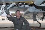 Capt. Bill Lujan, a 435th Fighter Training Squadron Introduction to Fighter Fundamentals student, performs a pre-flight check on a T-38 on the flightline June 10. The squadron, Randolph's only fighter training squadron, has been harbored in a trailer since it was reassigned to Randolph in November 2006 and will soon move to its new, permanent location in Hangar 6. (U.S. Air Force photo by Don Lindsey)(U.S. Air Force photo by Don Lindsey)