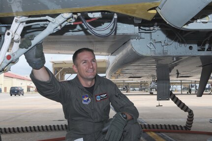 Capt. Bill Lujan, a 435th Fighter Training Squadron Introduction to Fighter Fundamentals student, performs a pre-flight check on a T-38 on the flightline June 10. The squadron, Randolph's only fighter training squadron, has been harbored in a trailer since it was reassigned to Randolph in November 2006 and will soon move to its new, permanent location in Hangar 6. (U.S. Air Force photo by Don Lindsey)(U.S. Air Force photo by Don Lindsey)