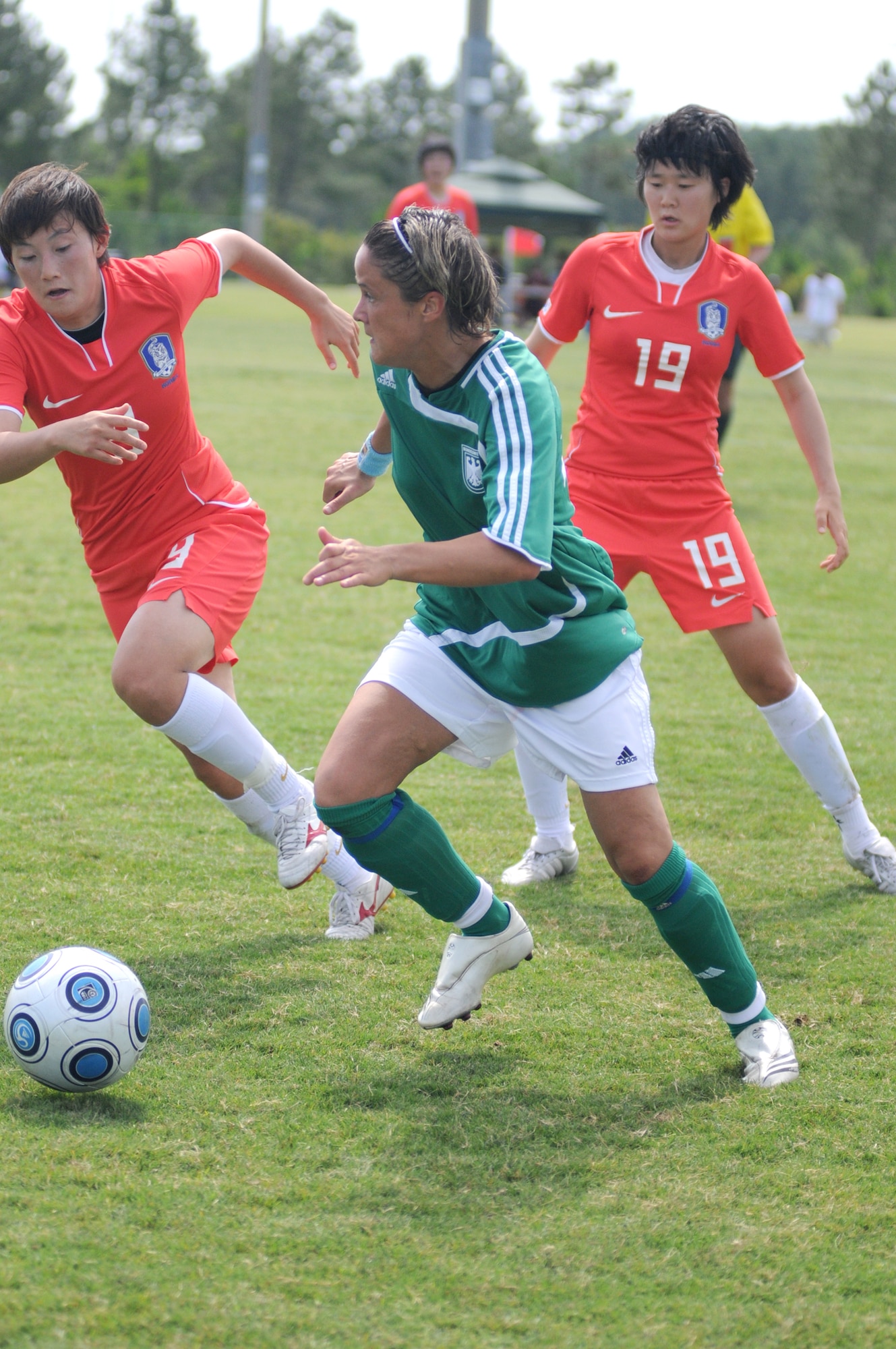 Germany and The Republic of South Korea compete during the 5th CISM Women’s Soccer Championship at the Gulfport Sports Complex 9 June.  The CISM tournament, hosted by Keesler Air Force Base, includes teams from Brazil, Canada, France, Germany, The Netherlands, The Republic of South Korea and the United States.  Matches are being held June 6 to 13, with the Gold match June 13 at 2 p.m.  Organizers say the tournament gives teams and people who attend a chance to develop bonds and life-long friendships between the countries and a chance to learn about one another’s cultural similarities and differences.  (U.S. Air Force photo by Kemberly Groue)