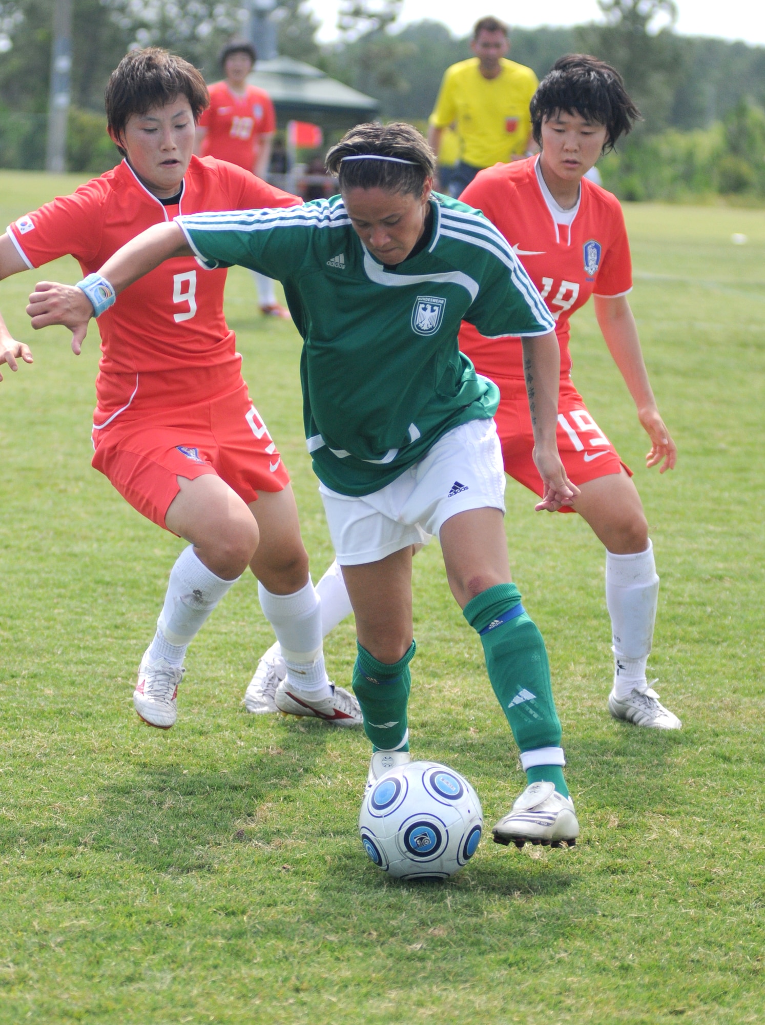 Germany and The Republic of South Korea compete during the 5th CISM Women’s Soccer Championship at the Gulfport Sports Complex 9 June.  The CISM tournament, hosted by Keesler Air Force Base, includes teams from Brazil, Canada, France, Germany, The Netherlands, The Republic of South Korea and the United States.  Matches are being held June 6 to 13, with the Gold match June 13 at 2 p.m.  Organizers say the tournament gives teams and people who attend a chance to develop bonds and life-long friendships between the countries and a chance to learn about one another’s cultural similarities and differences.  (U.S. Air Force photo by Kemberly Groue)