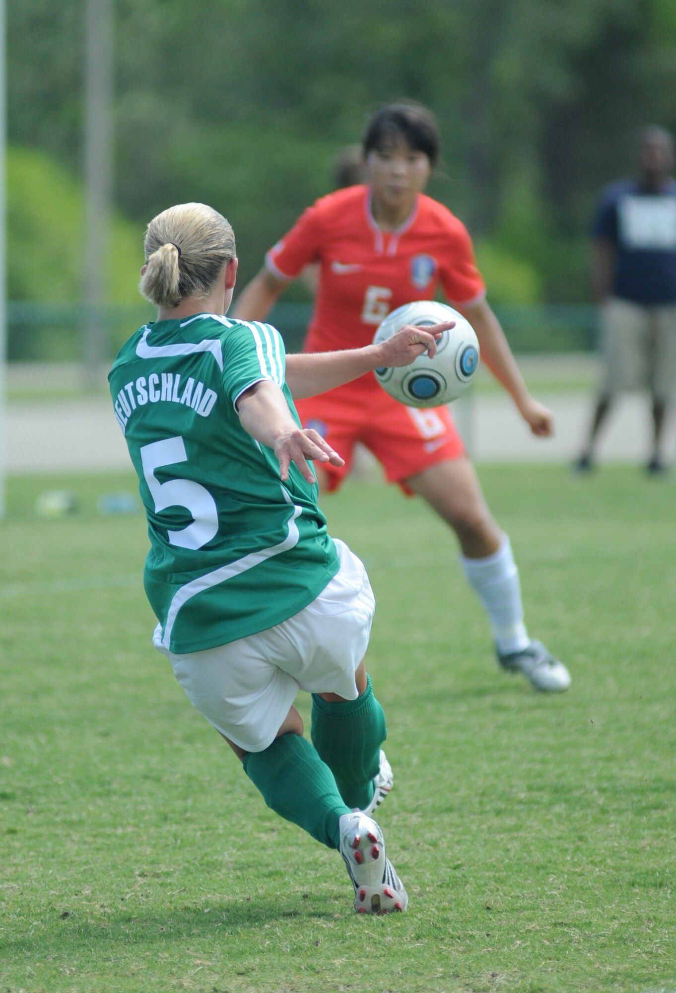 Germany and The Republic of South Korea compete during the 5th CISM Women’s Soccer Championship at the Gulfport Sports Complex 9 June.  The CISM tournament, hosted by Keesler Air Force Base, includes teams from Brazil, Canada, France, Germany, The Netherlands, The Republic of South Korea and the United States.  Matches are being held June 6 to 13, with the Gold match June 13 at 2 p.m.  Organizers say the tournament gives teams and people who attend a chance to develop bonds and life-long friendships between the countries and a chance to learn about one another’s cultural similarities and differences.  (U.S. Air Force photo by Kemberly Groue)