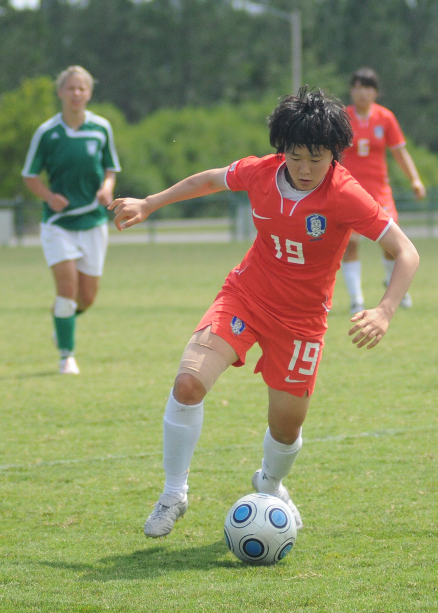 Germany and The Republic of South Korea compete during the 5th CISM Women’s Soccer Championship at the Gulfport Sports Complex 9 June.  The CISM tournament, hosted by Keesler Air Force Base, includes teams from Brazil, Canada, France, Germany, The Netherlands, The Republic of South Korea and the United States.  Matches are being held June 6 to 13, with the Gold match June 13 at 2 p.m.  Organizers say the tournament gives teams and people who attend a chance to develop bonds and life-long friendships between the countries and a chance to learn about one another’s cultural similarities and differences.  (U.S. Air Force photo by Kemberly Groue)