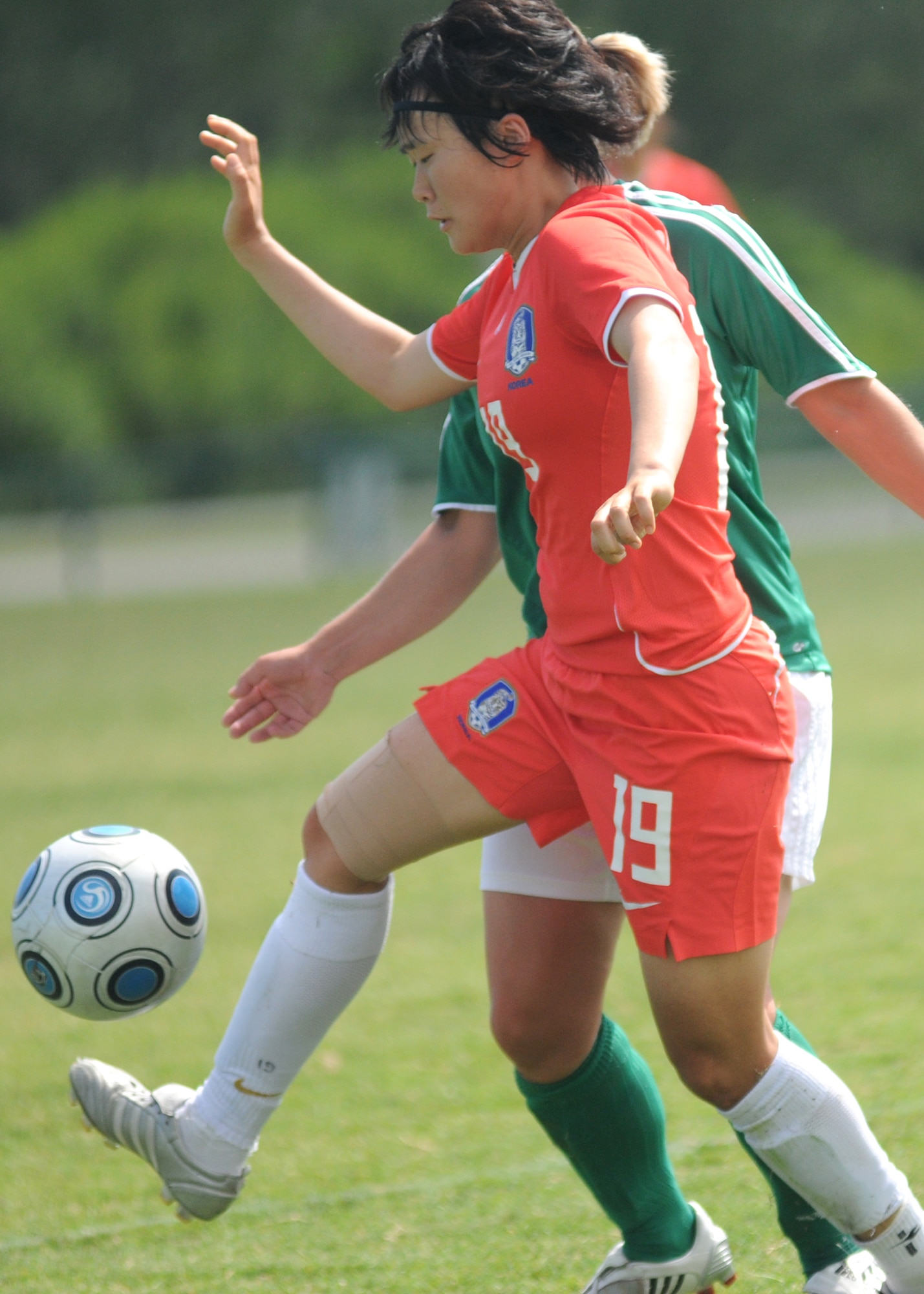 Germany and The Republic of South Korea compete during the 5th CISM Women’s Soccer Championship at the Gulfport Sports Complex 9 June.  The CISM tournament, hosted by Keesler Air Force Base, includes teams from Brazil, Canada, France, Germany, The Netherlands, The Republic of South Korea and the United States.  Matches are being held June 6 to 13, with the Gold match June 13 at 2 p.m.  Organizers say the tournament gives teams and people who attend a chance to develop bonds and life-long friendships between the countries and a chance to learn about one another’s cultural similarities and differences.  (U.S. Air Force photo by Kemberly Groue)