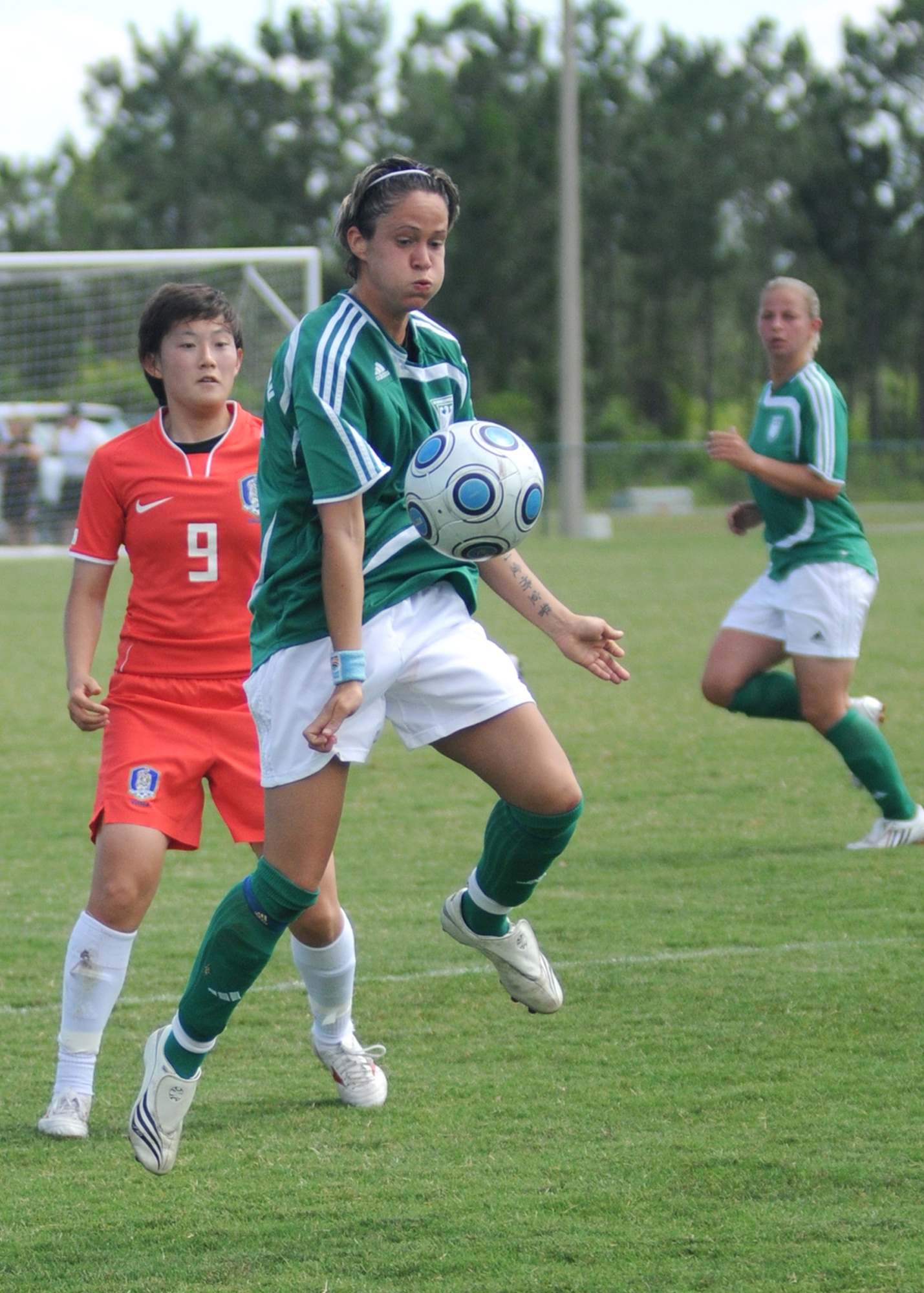Germany and The Republic of South Korea compete during the 5th CISM Women’s Soccer Championship at the Gulfport Sports Complex 9 June.  The CISM tournament, hosted by Keesler Air Force Base, includes teams from Brazil, Canada, France, Germany, The Netherlands, The Republic of South Korea and the United States.  Matches are being held June 6 to 13, with the Gold match June 13 at 2 p.m.  Organizers say the tournament gives teams and people who attend a chance to develop bonds and life-long friendships between the countries and a chance to learn about one another’s cultural similarities and differences.  (U.S. Air Force photo by Kemberly Groue)