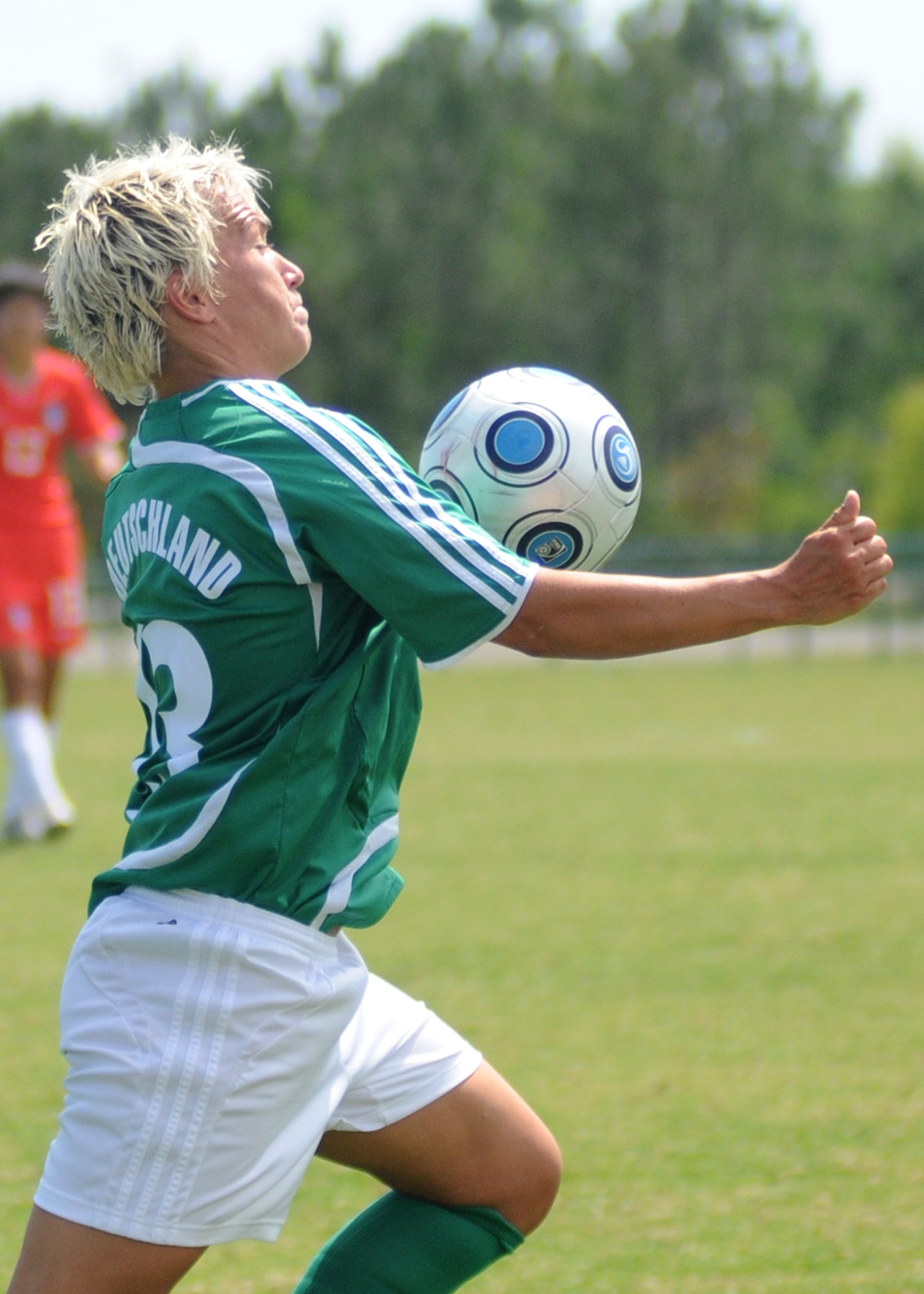 Germany and The Republic of South Korea compete during the 5th CISM Women’s Soccer Championship at the Gulfport Sports Complex 9 June.  The CISM tournament, hosted by Keesler Air Force Base, includes teams from Brazil, Canada, France, Germany, The Netherlands, The Republic of South Korea and the United States.  Matches are being held June 6 to 13, with the Gold match June 13 at 2 p.m.  Organizers say the tournament gives teams and people who attend a chance to develop bonds and life-long friendships between the countries and a chance to learn about one another’s cultural similarities and differences.  (U.S. Air Force photo by Kemberly Groue)