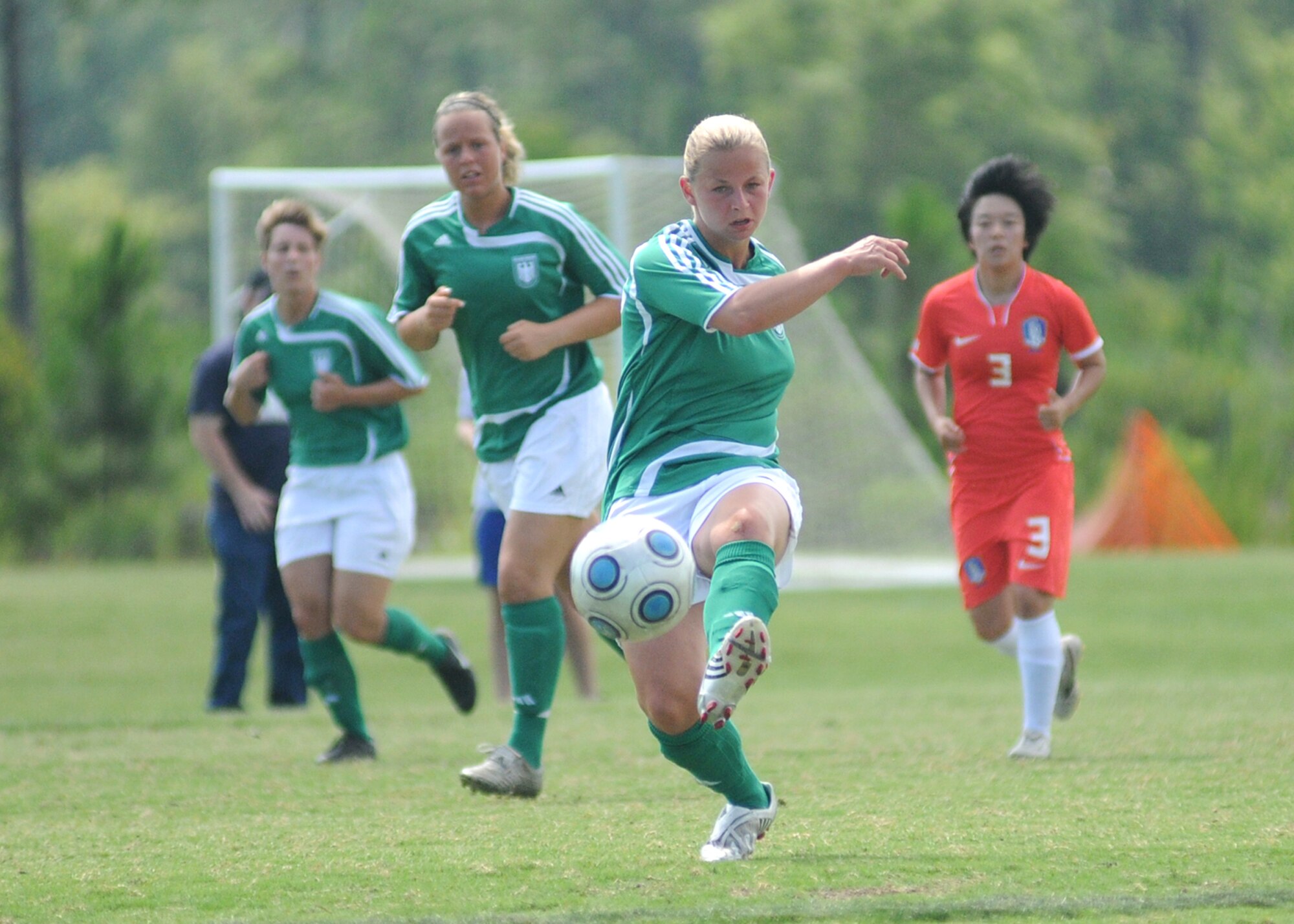 Germany and The Republic of South Korea compete during the 5th CISM Women’s Soccer Championship at the Gulfport Sports Complex 9 June.  The CISM tournament, hosted by Keesler Air Force Base, includes teams from Brazil, Canada, France, Germany, The Netherlands, The Republic of South Korea and the United States.  Matches are being held June 6 to 13, with the Gold match June 13 at 2 p.m.  Organizers say the tournament gives teams and people who attend a chance to develop bonds and life-long friendships between the countries and a chance to learn about one another’s cultural similarities and differences.  (U.S. Air Force photo by Kemberly Groue)