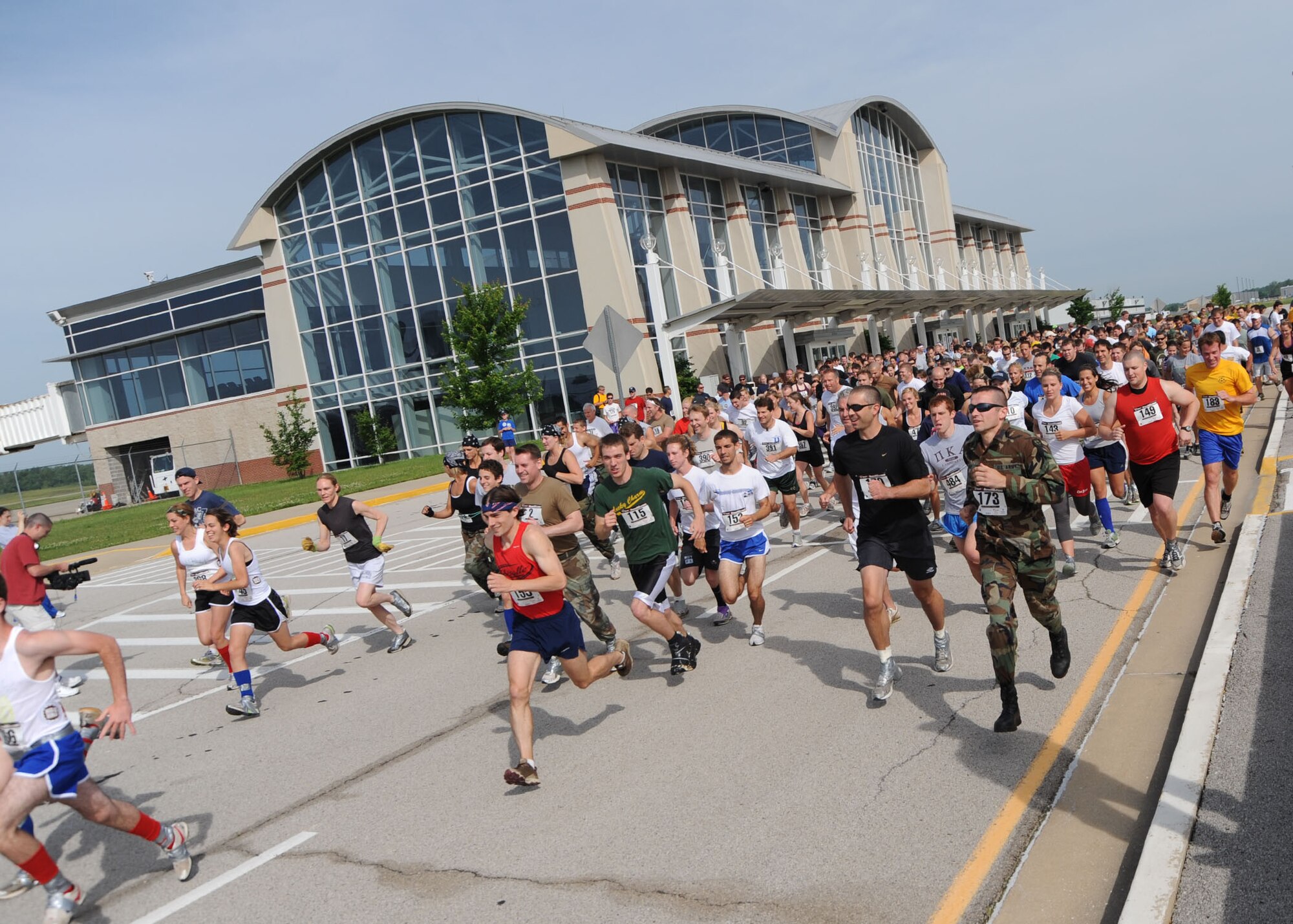 SCOTT AIR FORCE BASE, Ill. -- Runners begin the USO 5K Mud Run at MidAmerica Airport.  Nearly 400 runners raised almost $6,000 for the USO of Missouri. (U.S. Air Force photo/ Tech. Sgt. Michelle Larche)