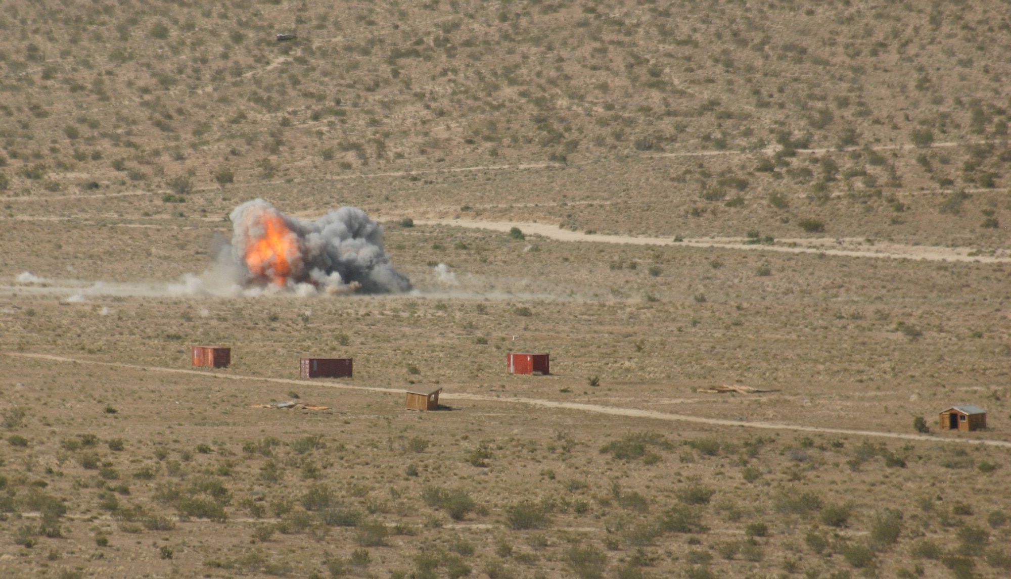 An Air Force F-15E provides precision strike capability to support 4th BCT, 1st Infantry Division during joint air attack team training at NTC in Ft. Irwin, Calif.  (JFIIT photo/Casey Bain)