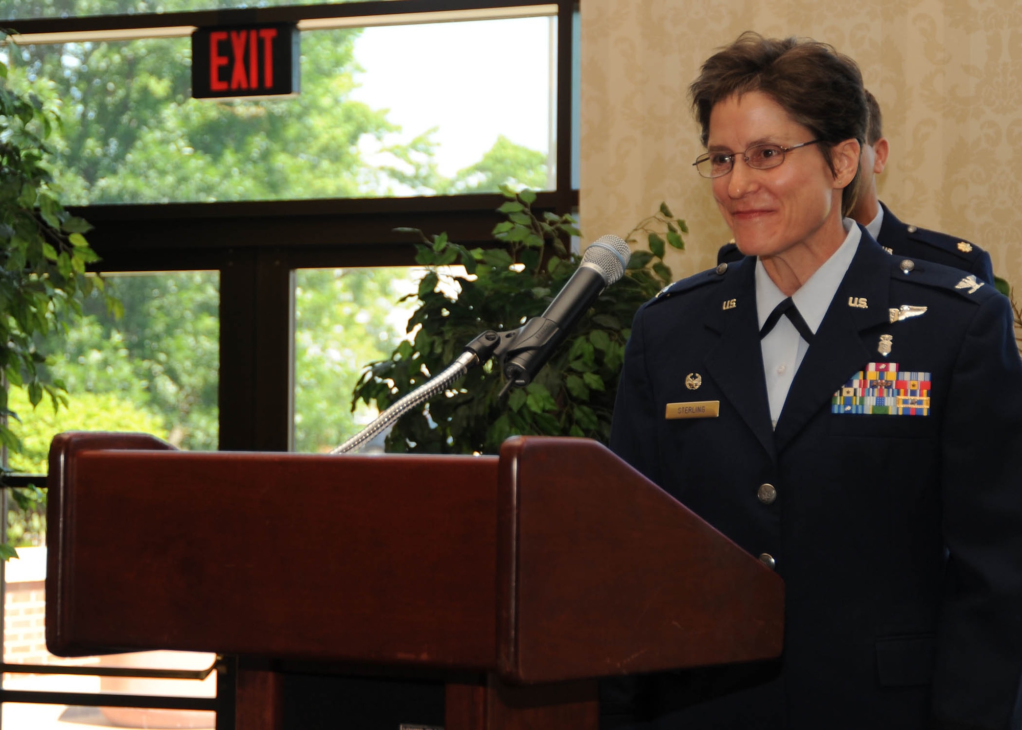 SCOTT AIR FORCE BASE, Ill. -- Col. Jill Sterling, 375th Medical Group commander, speaks at the Scott Club June 1 during the 375th MDG's change of command ceremony. 