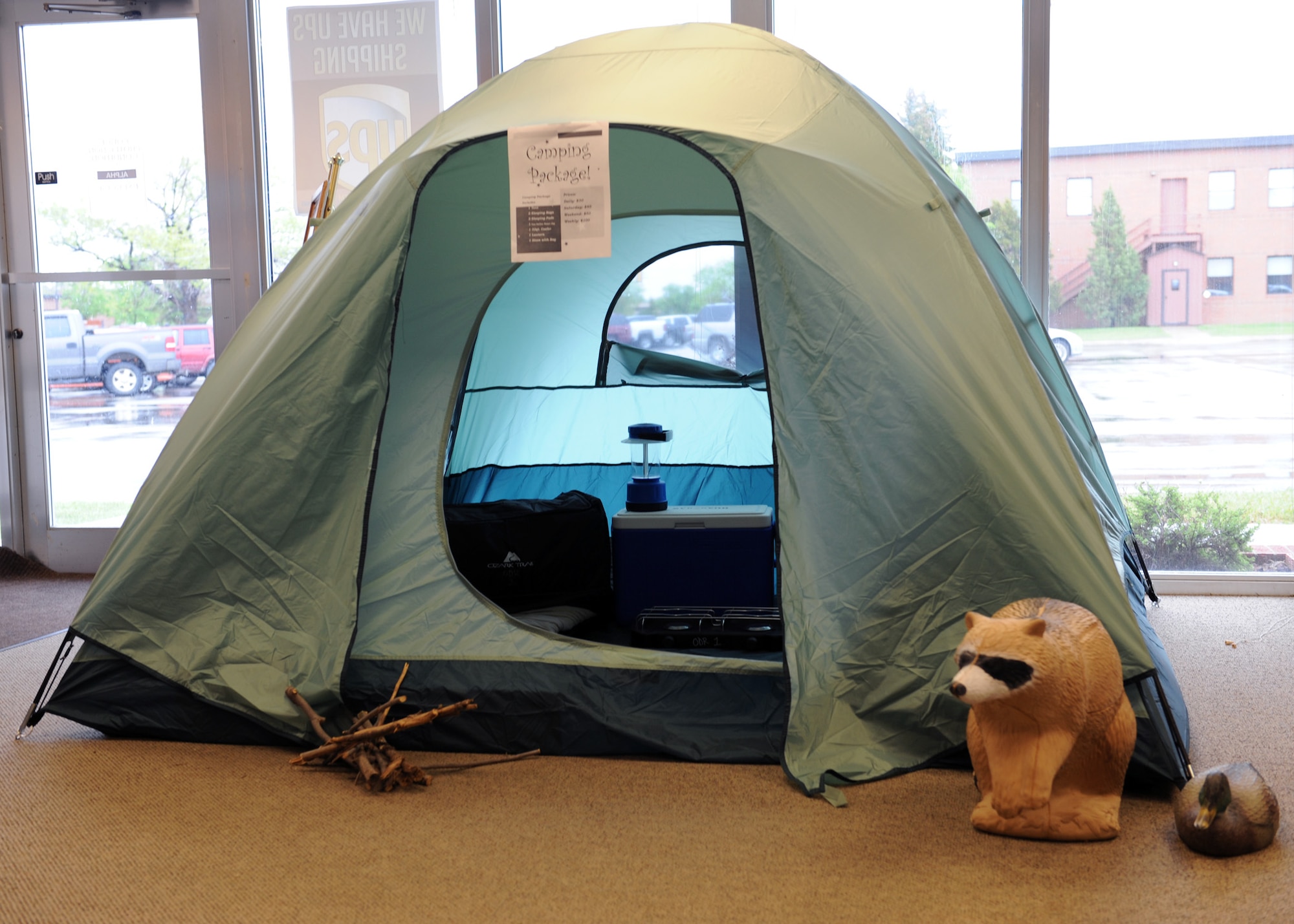 MINOT AIR FORCE BASE, ND – New camping packages are being offered by the 5th Force Support Squadron’s Outdoor Recreation office.  This package includes a tent, two sleeping bags, two sleeping pads, a 32-quart cooler, a two-gallon water jug, a lantern, and a cooking stove—all for one flat fee.  This and other packages and services are available to members of Minot Air Force Base at daily, weekly, and weekend prices. (US Air Force photo by Staff Sgt. Keith Ballard)