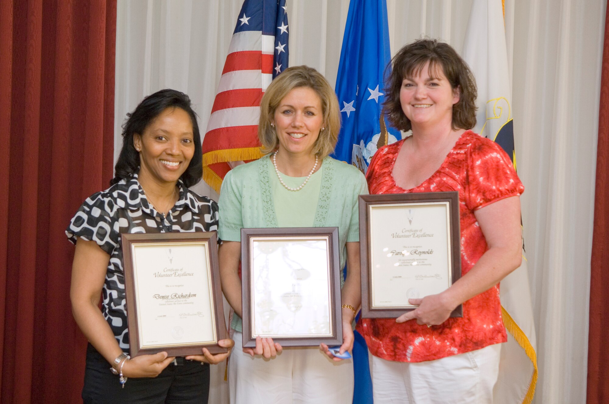 HANSCOM AIR FORCE BASE, Mass. –Hanscom’s Volunteer award winners from left, Denise Richardson, Cindy Canavan and Carolyn Reynolds are shown with their certificates of recognition at the Hanscom Volunteer Salute ceremony on June 4 at the Minuteman Club. Lydia Frank, not pictured, was also recognized for her volunteer contributions to the Hanscom community. Also recognized for their volunteer work during the ceremony were Steve Fuss, Edward Mason, Barbara Mullin, Linda Fisher, and Christine Nicklas. (U.S. Air Force photo by Mark Wyatt)