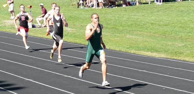 C.M. Russell senior track star Chris Wilson races towards the finish line well ahead of his competition in the 200-meter sprint at the state track meet May 30. He won the event and broke the record with his time of 21.51 seconds. (Courtesy photo)
